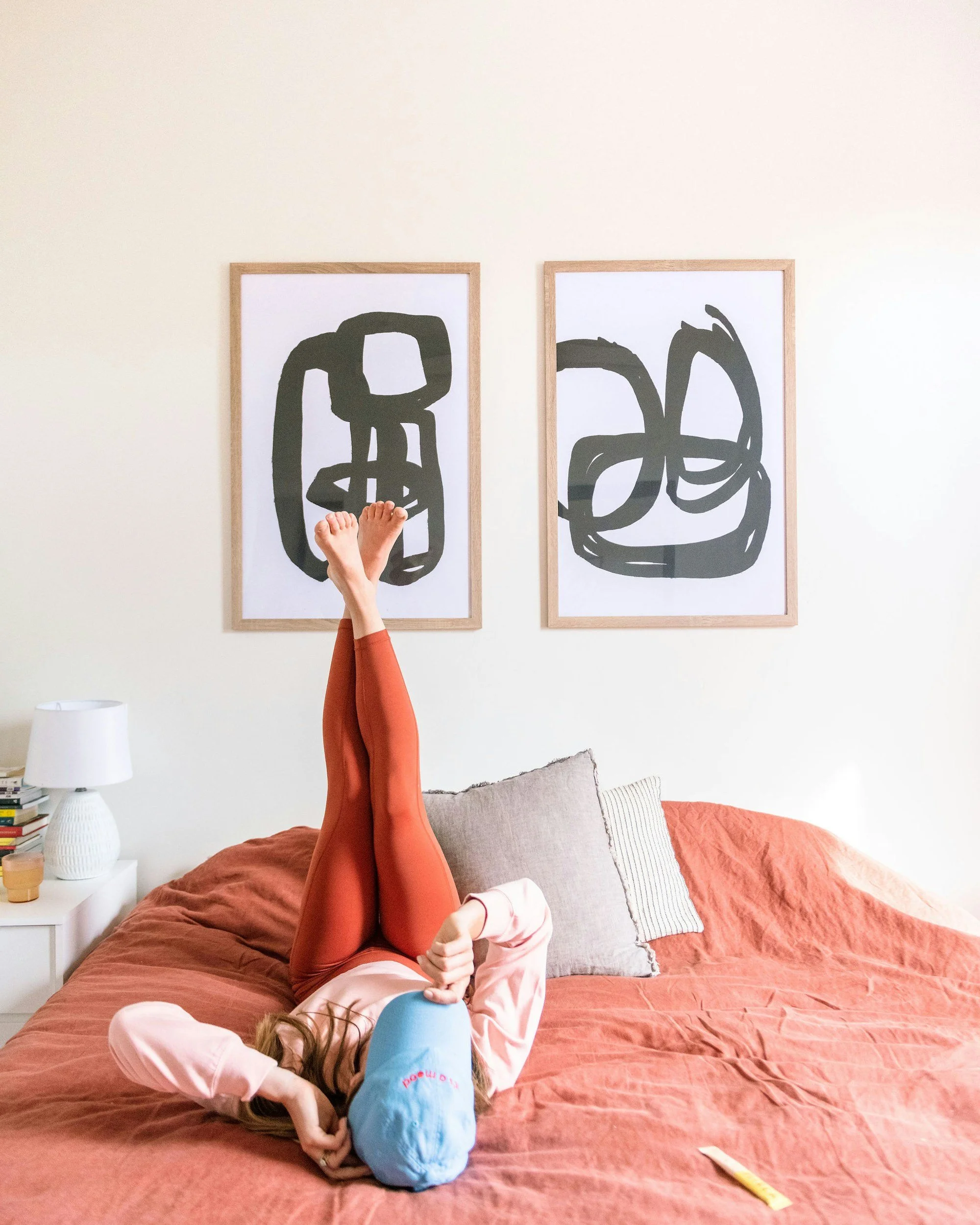 woman laying and stretching to help ground herself to relieve stress after her trauma