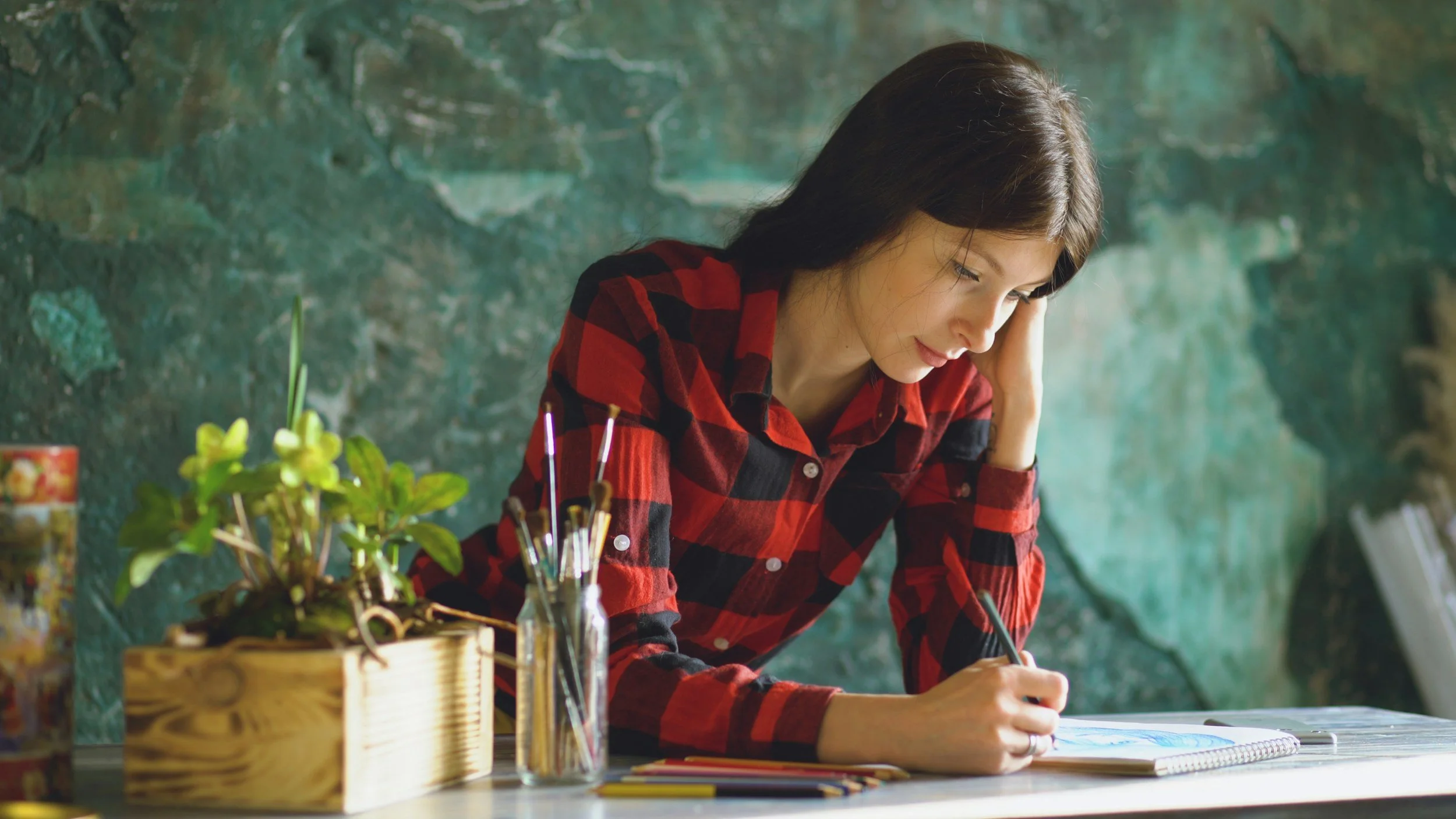 woman creating a plan to help her stop over functioning