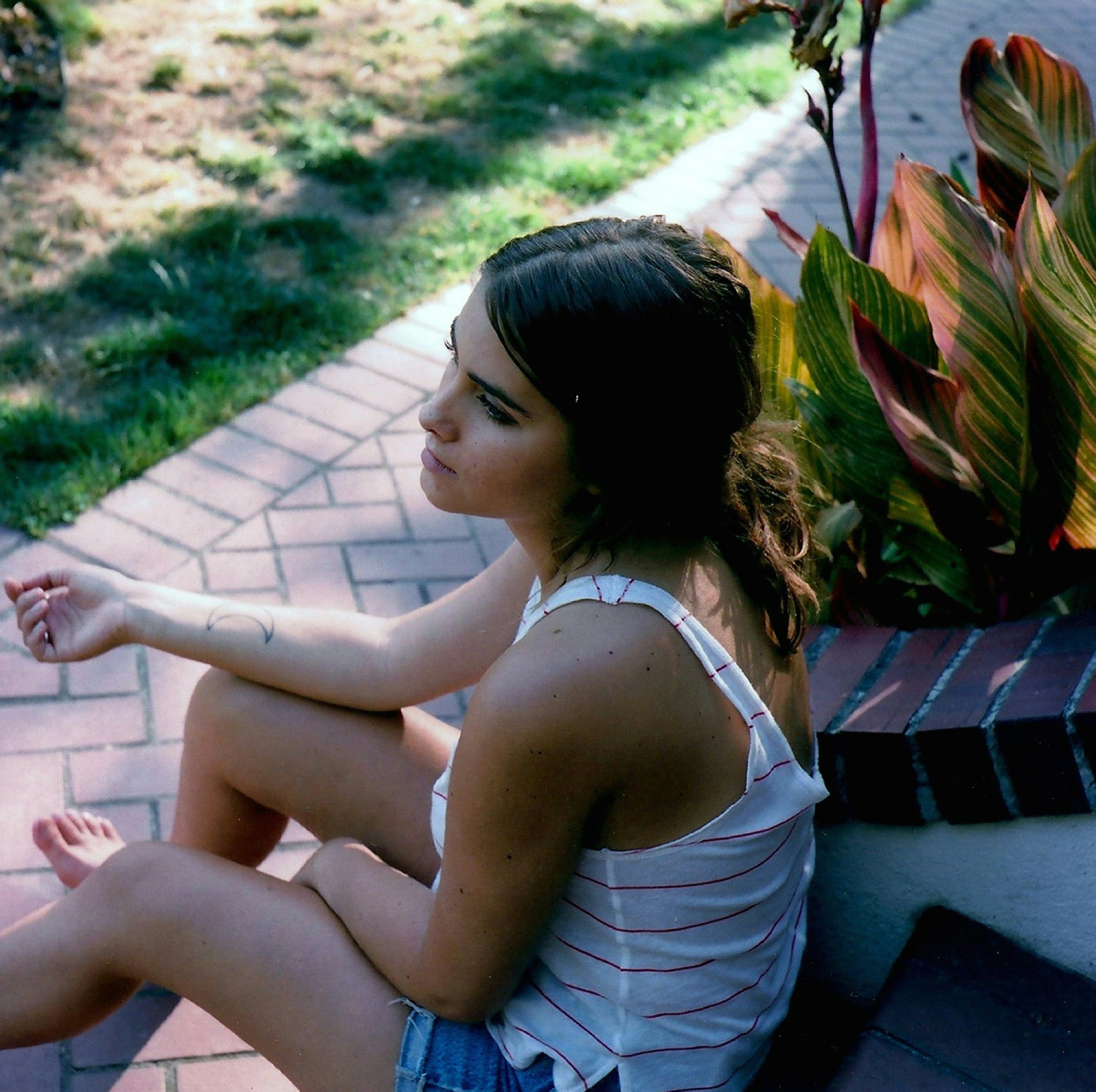 woman stressed rather than enjoying time with her family due to unresolved trauma