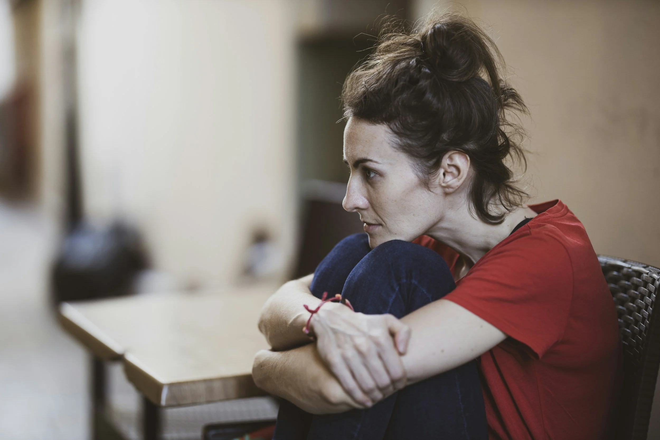 woman upset as she tries to parent her children and feeling like she is not good enough
