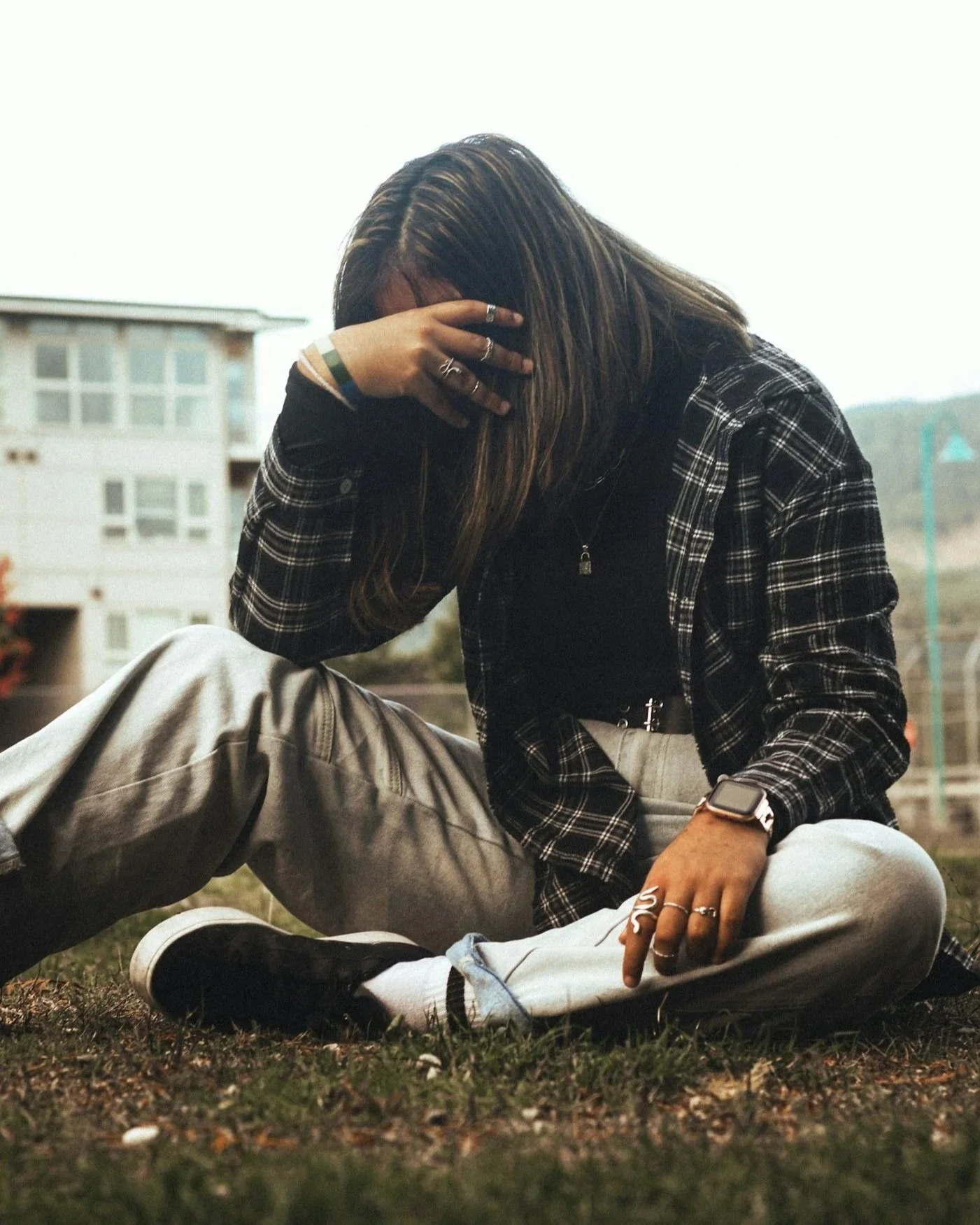 Sad woman with headache from betrayal trauma