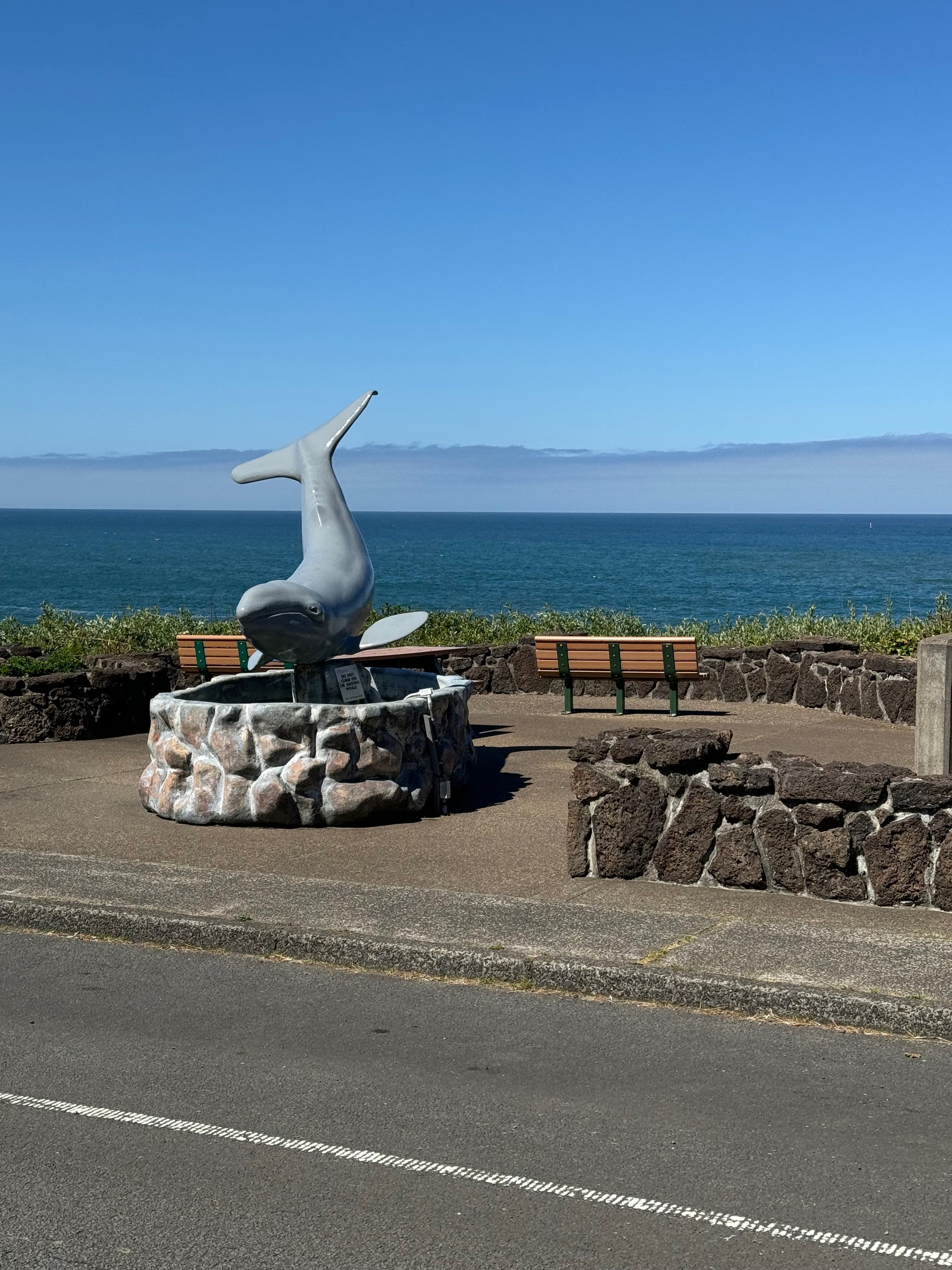 Whale Statue in Depoe Bay OR - Notice the marine layer fog in the distance