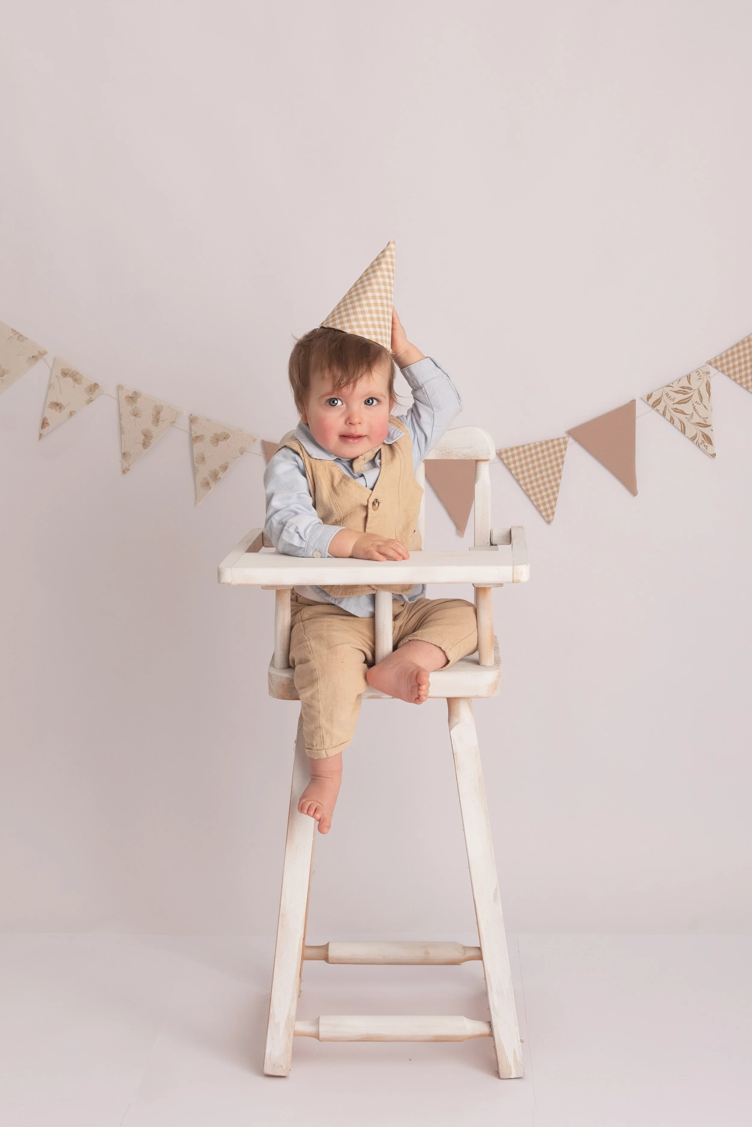niño de 1 año festejando su cumpleaños en sesion de fotos