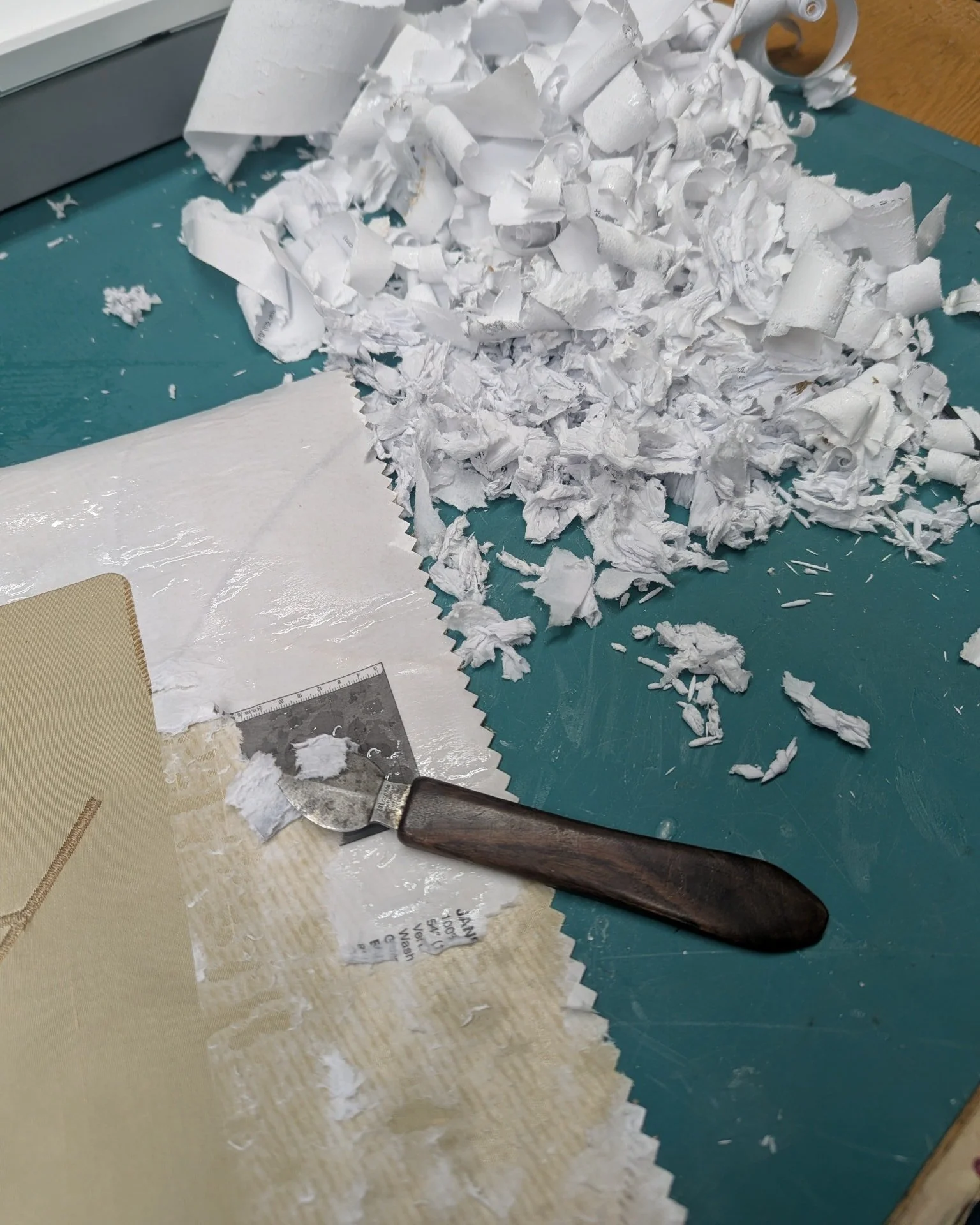 The downside of using decorator samples. I don't always scrape off the paper but this is the start of a special piece....I came up with the idea in the shower. 
So many of my pieces start there.