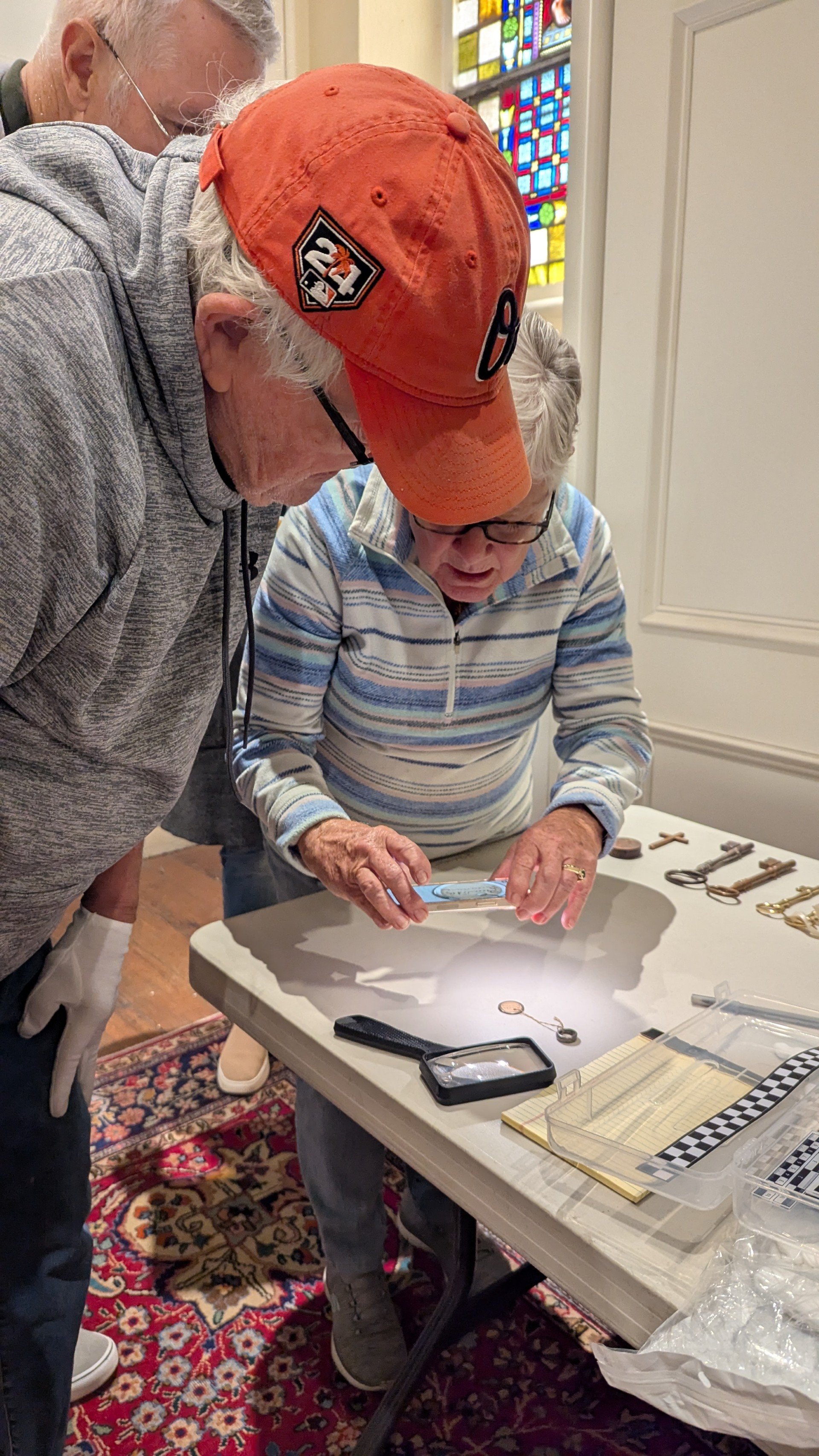 Ginger Dave and Jay examine St. Anne's artifacts.jpg
