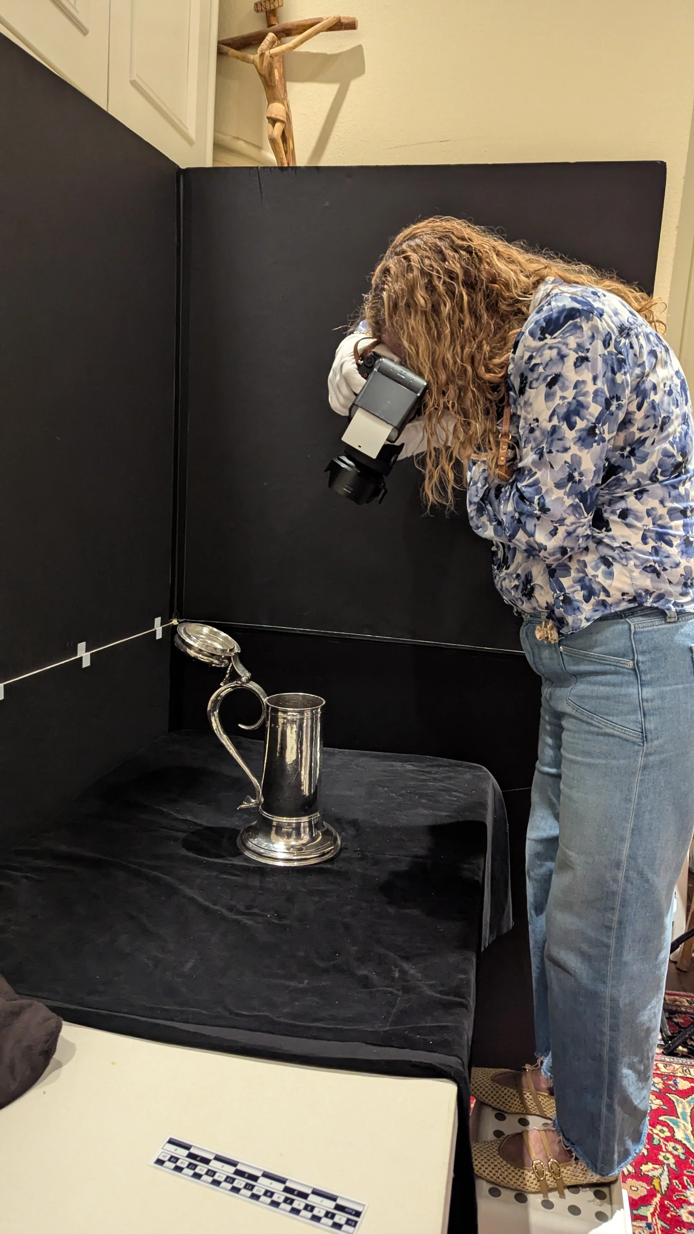 Laura taking a photo of the King William Silver Tankard.png