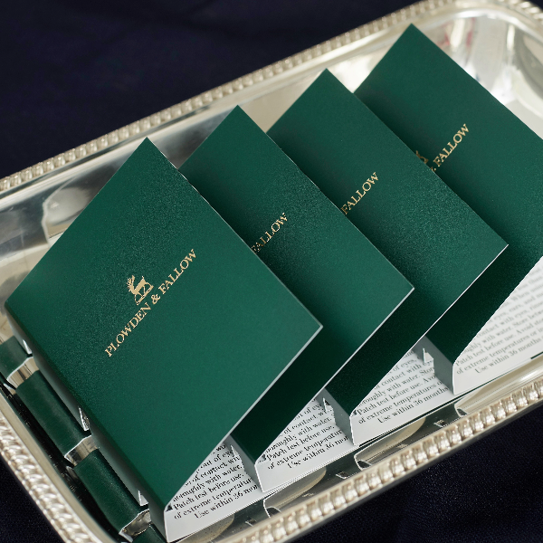 Image of Plowden & Fallow's Sample Vials, in cards, on a silver tray