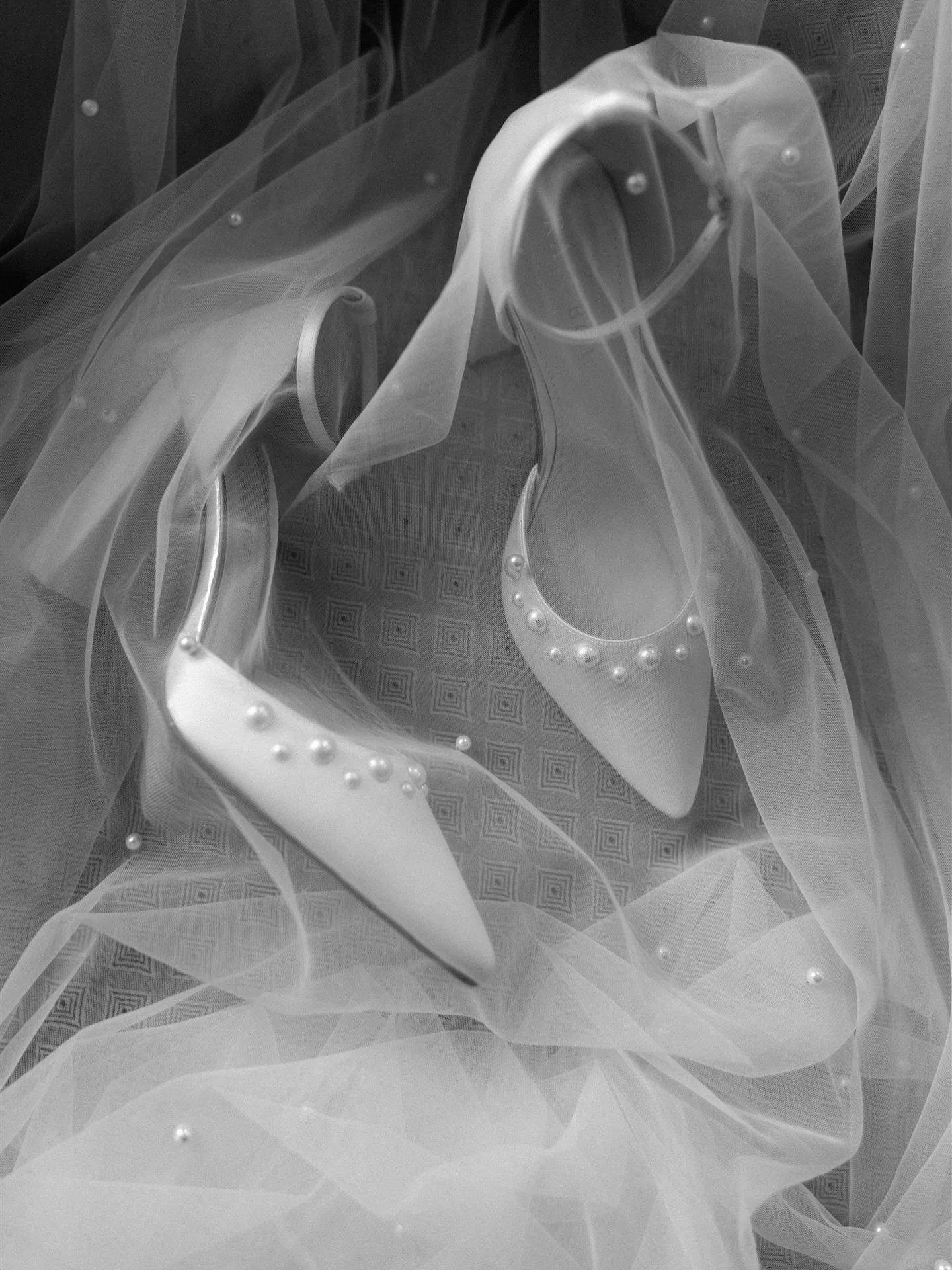 There&rsquo;s always a moment of stillness before everything begins, before the music starts and the room fills with people.

Soft tulle, delicate pearls and a beautiful pair of @rainbowclubuk heels, waiting in the morning light.

The details are par