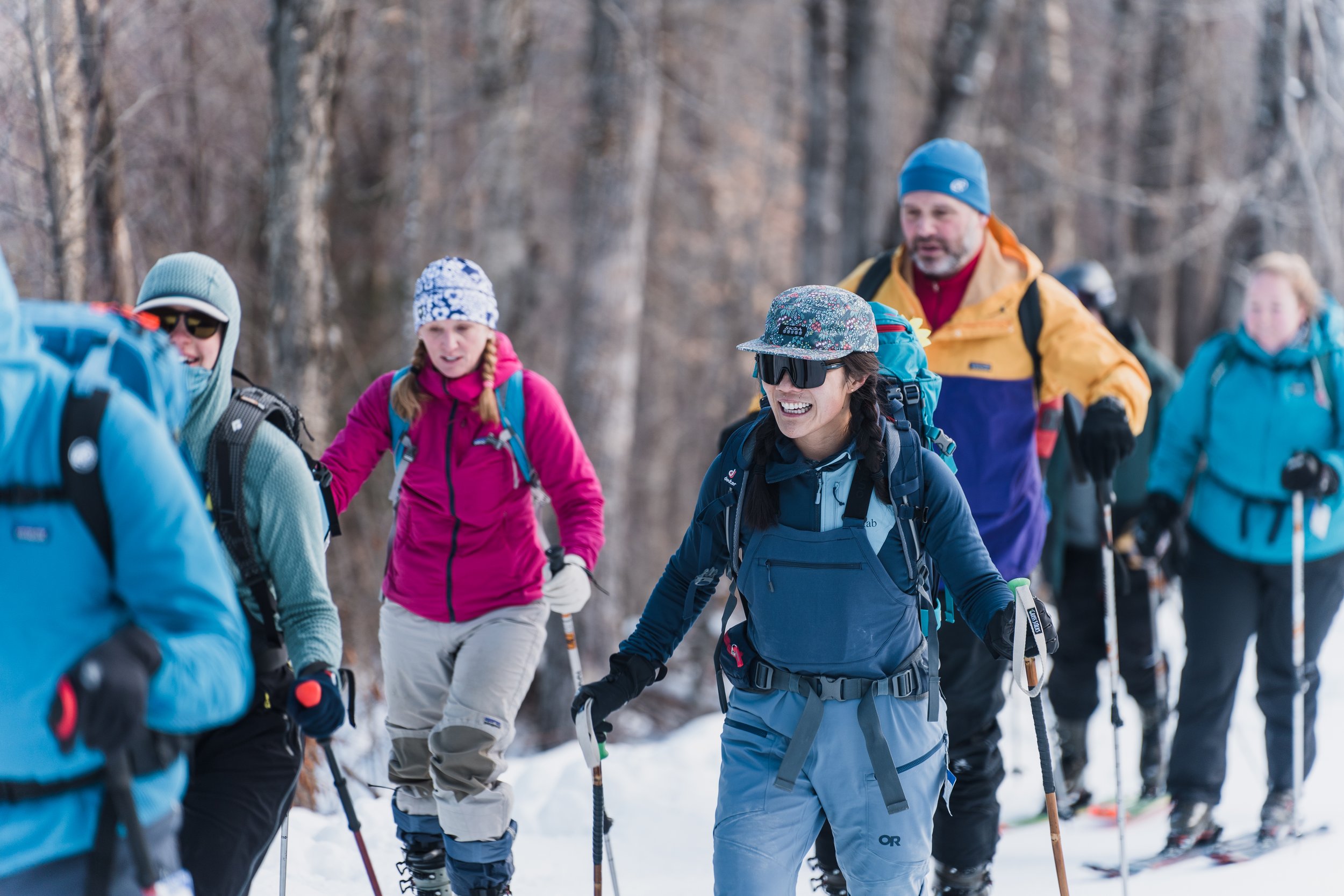 Participants skinning uphill together at Dartmouth Skiway
