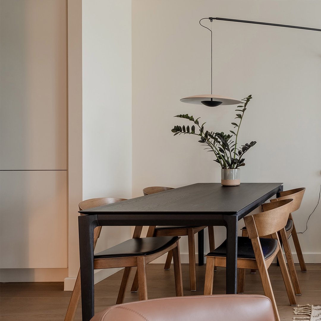 Swipe through to explore the seamless flow between the living and dining areas in our West Hampstead project! 🍃 

From the clean lines of the dining set to the cosy, neutral tones of the sofa, each piece is designed to create a balanced and inviting