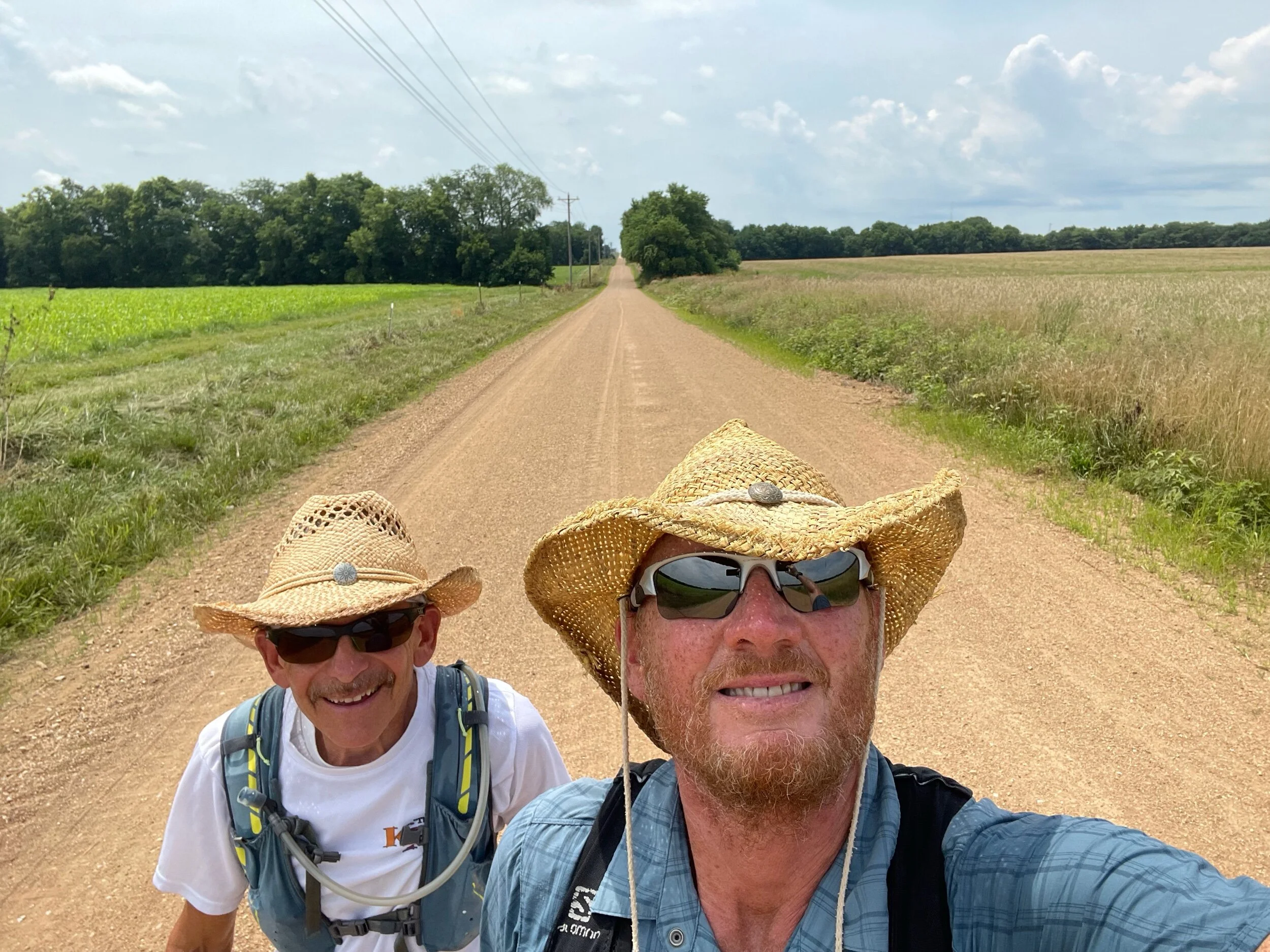 Sun is up, temp and humidity are high but the gravel road is quiet and we are happy to be right there