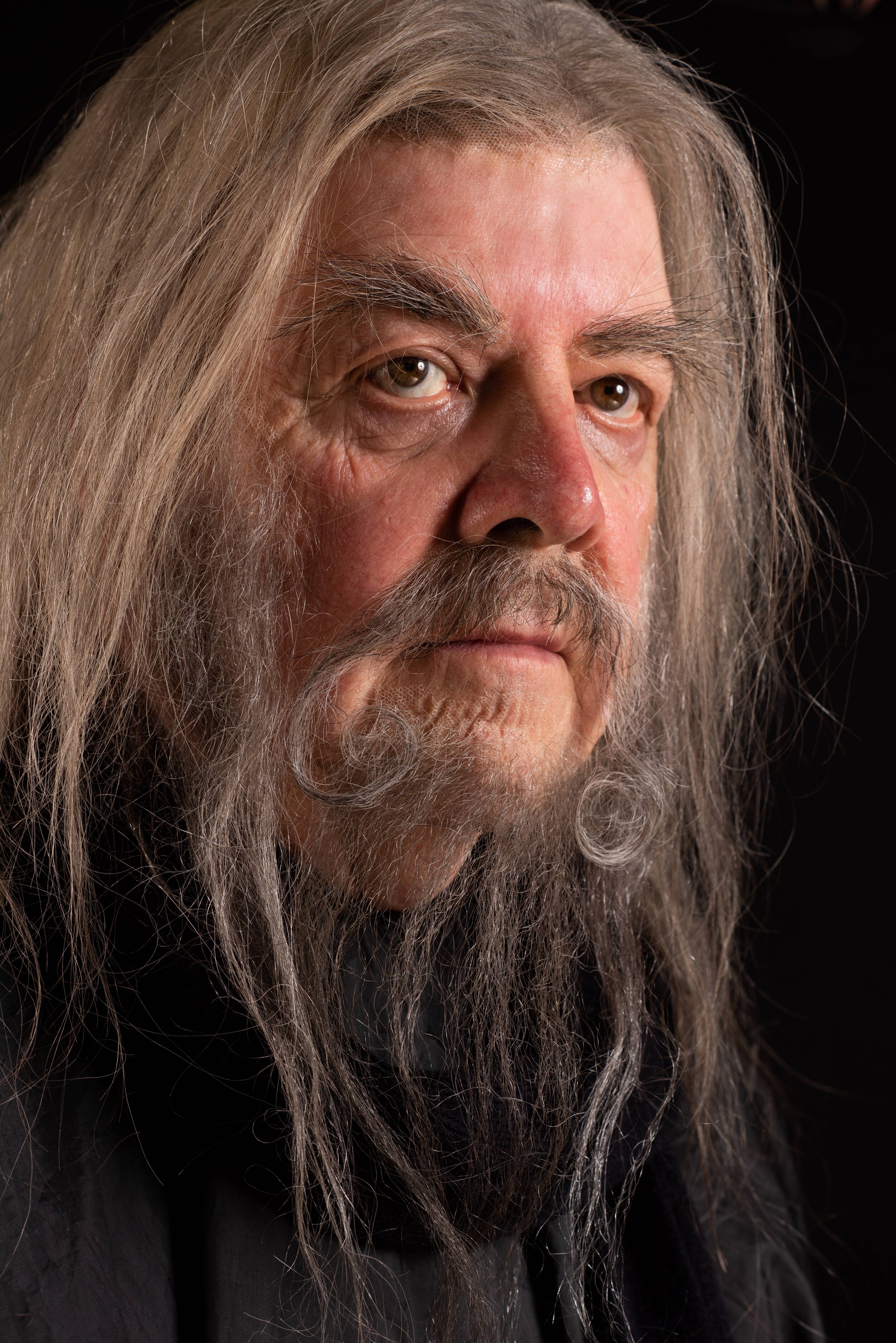 We added a light wig, which was then coloured lightly with some dark root spray. Lastly, laid on eyebrows to add to the character, before lightly reddening the nose and cheeks.