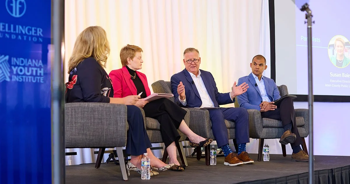 Photo of panelists discussing topic