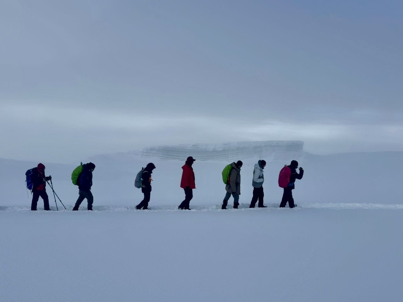 Walking through the snow on the summit of Kilimanjaro