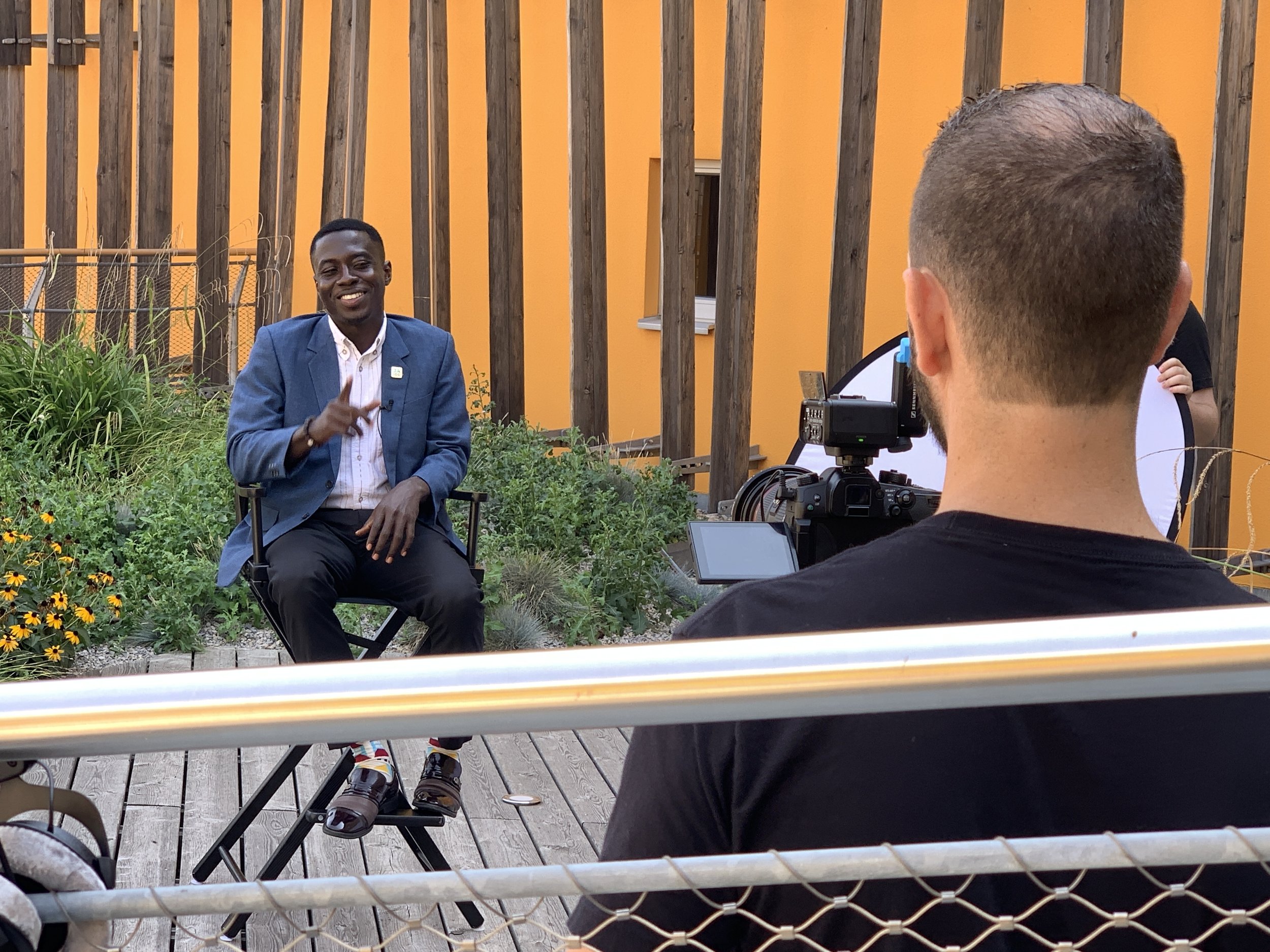 United National Foundation Community Manager, Emmanuel Nyame with Justin LeVrier in Vienna Austria filming content for JA University