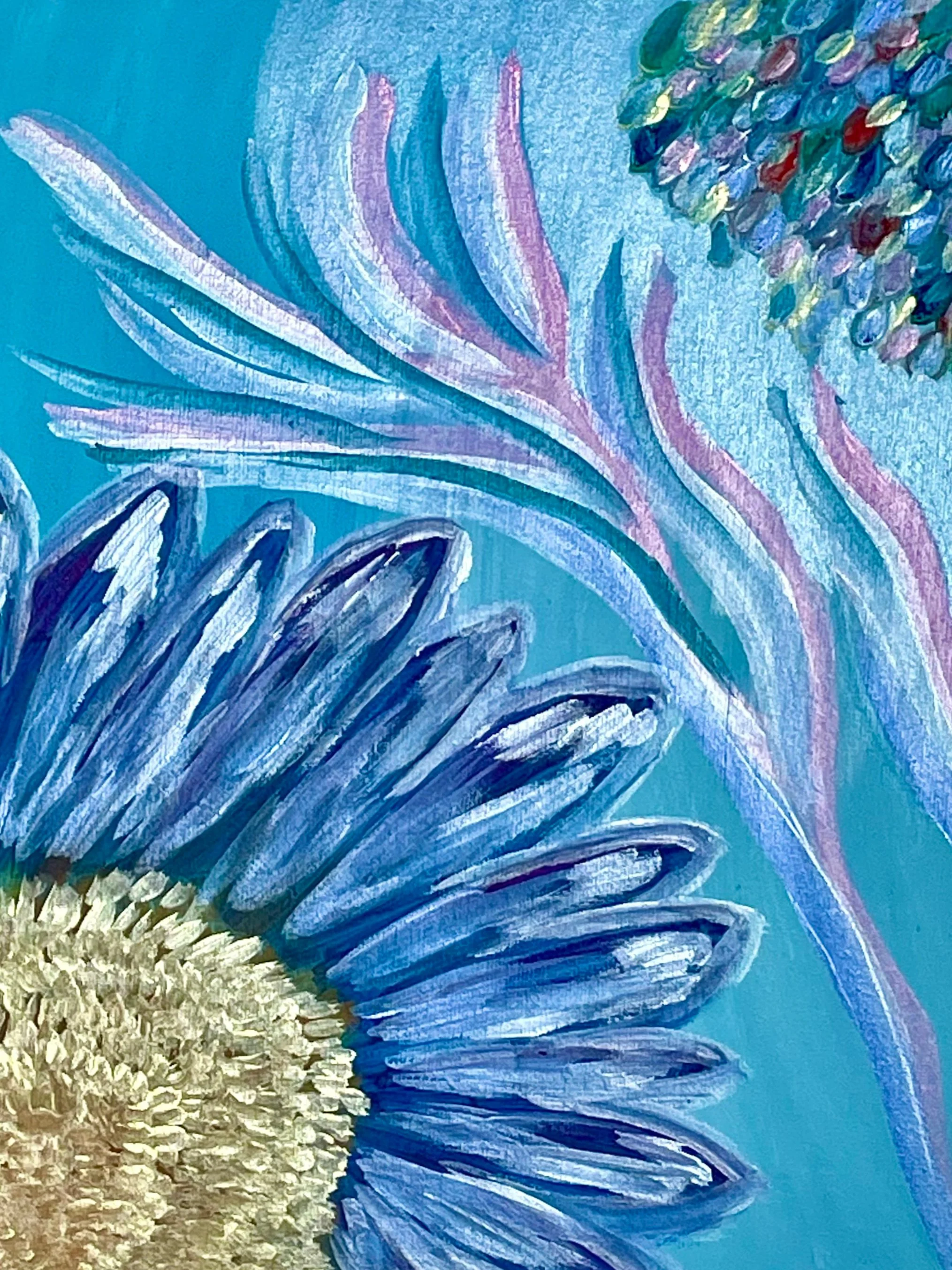 Blue daisy with gold centre, rainbow raindrops