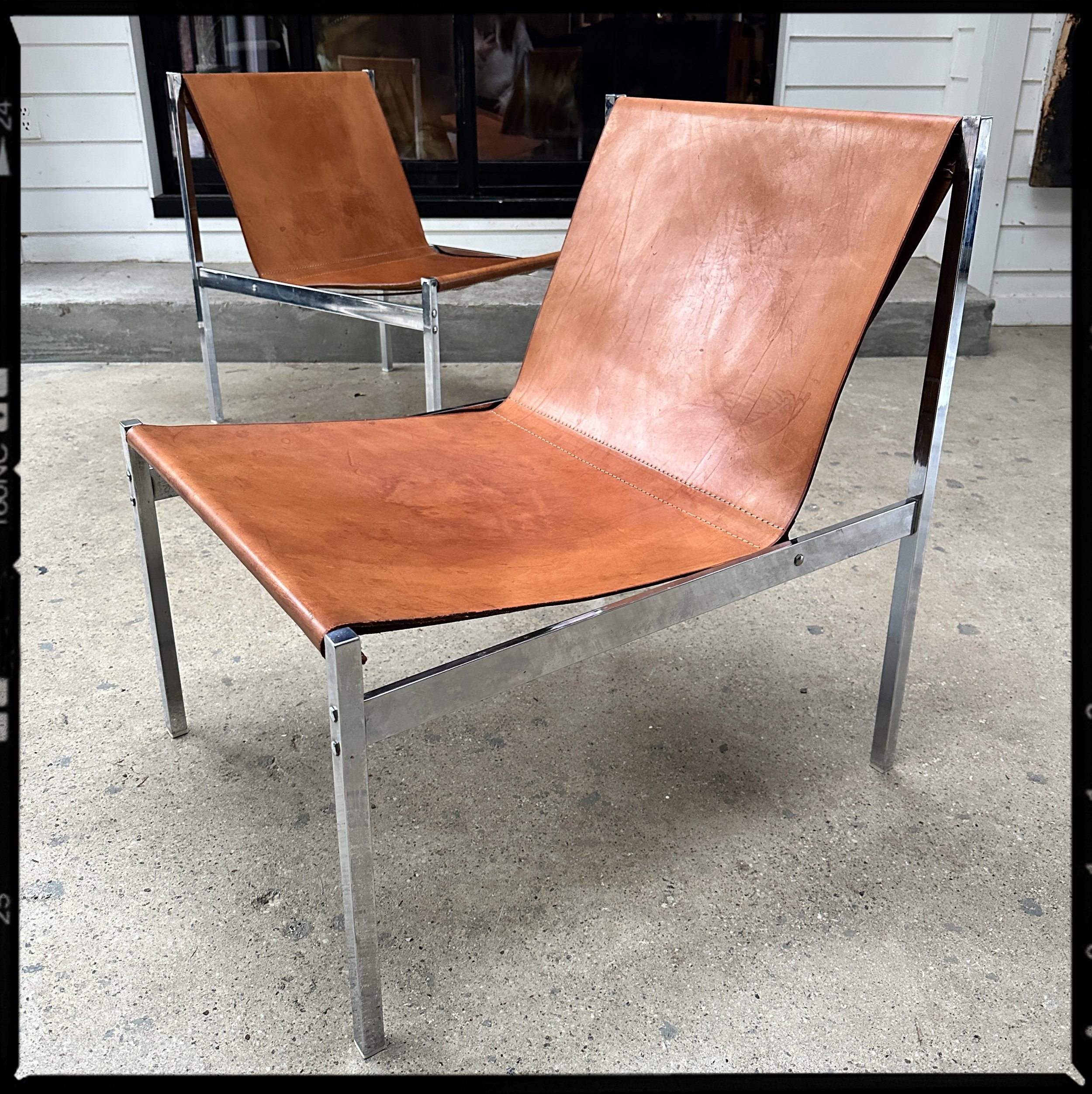 Mid Century Italian chrome and leather lounge chairs