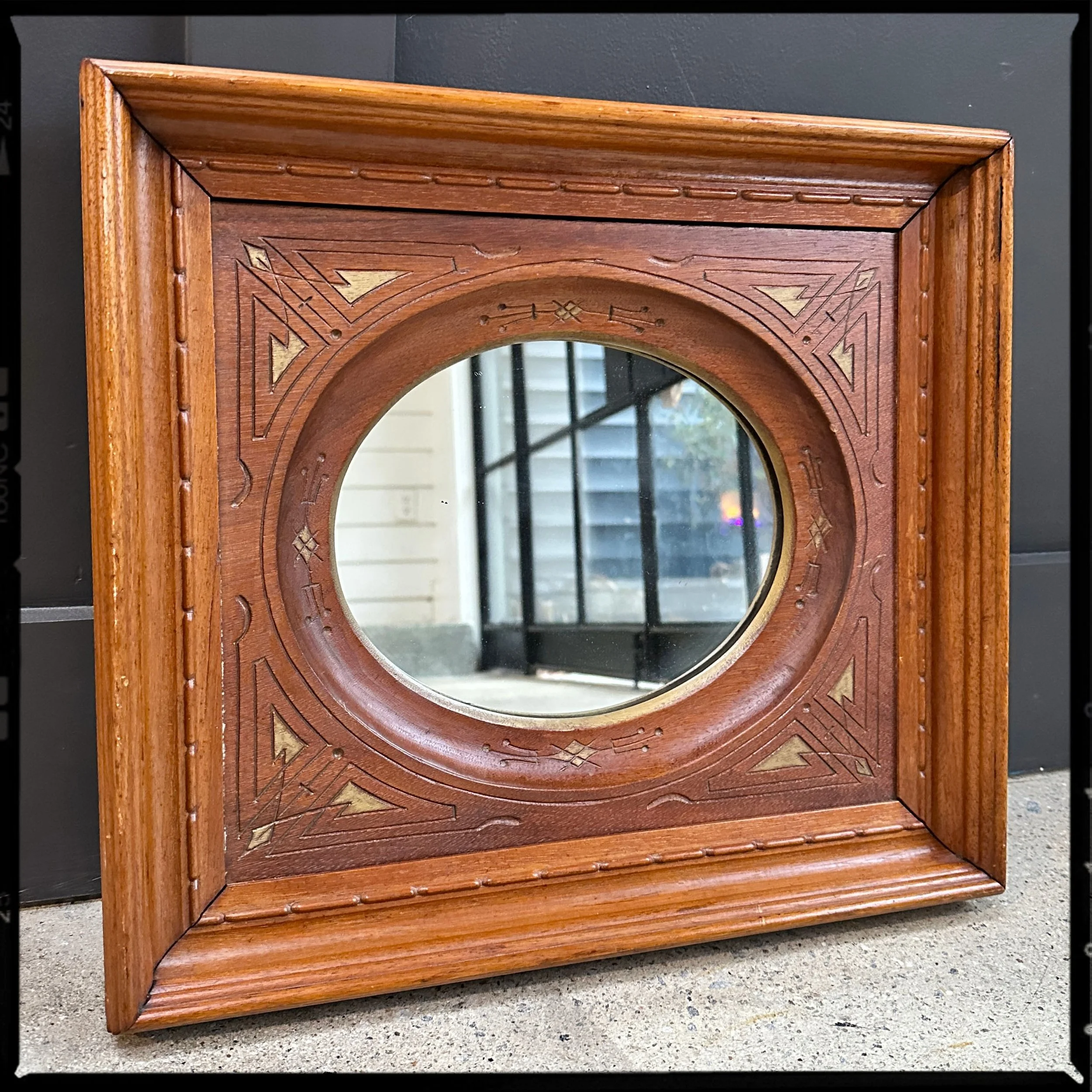 Vintage folk art carved oak hanging mirror