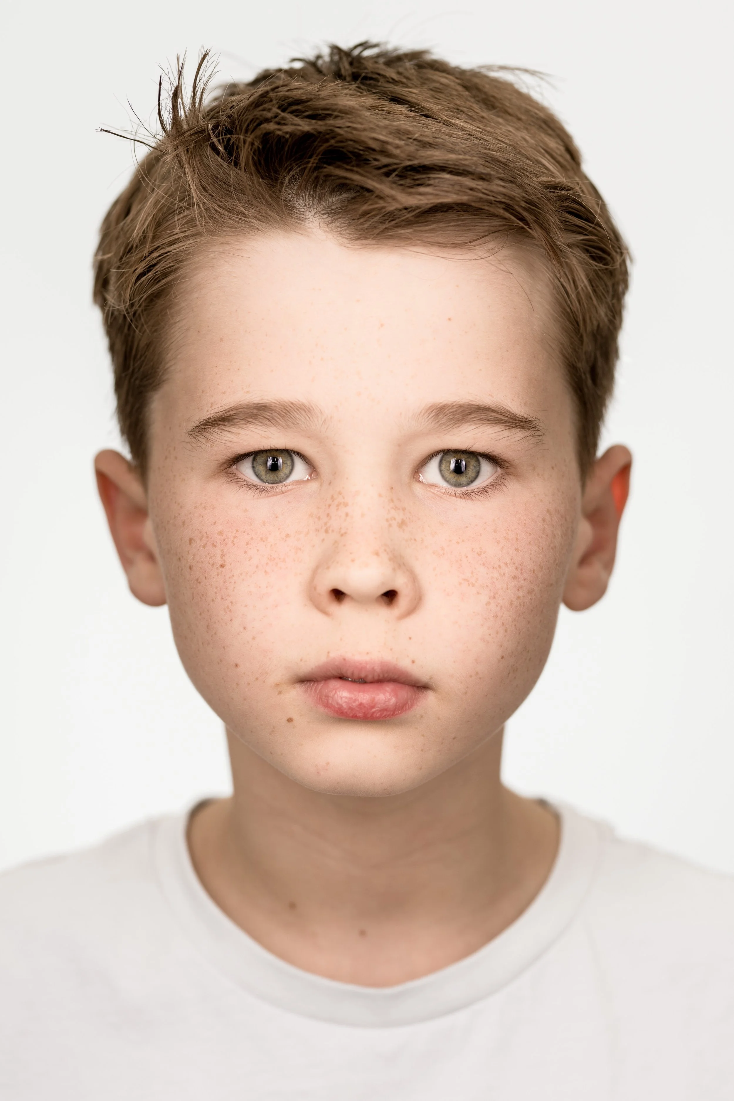 Fine art colour studio portrait of a boy, child photography Hertfordshire