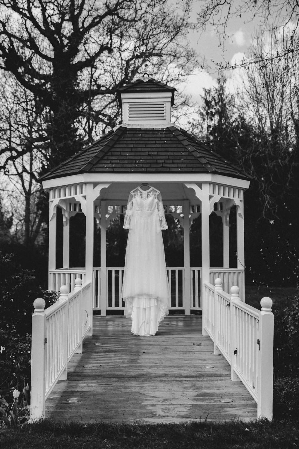 Vintage wedding dress hanging in Sheene Mill Summer pavilion 
