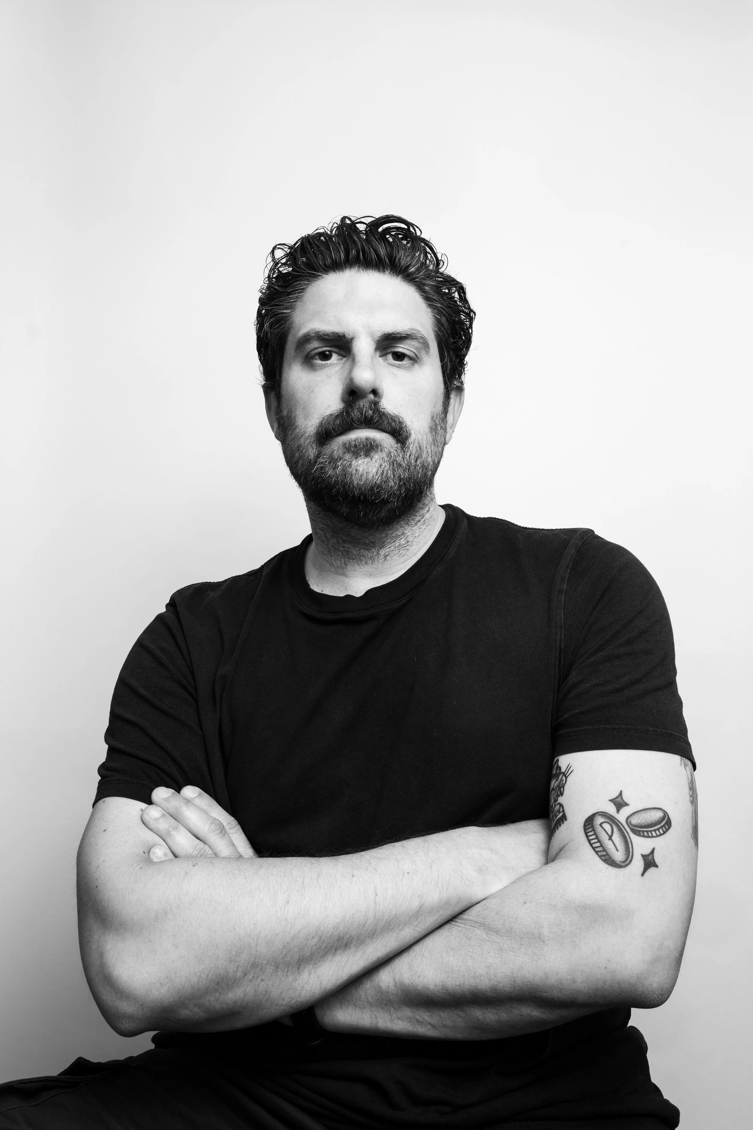 Gareth Jones, portrait and headshot photographer based in Royston, Hertfordshire, studio self portrait with arms crossed