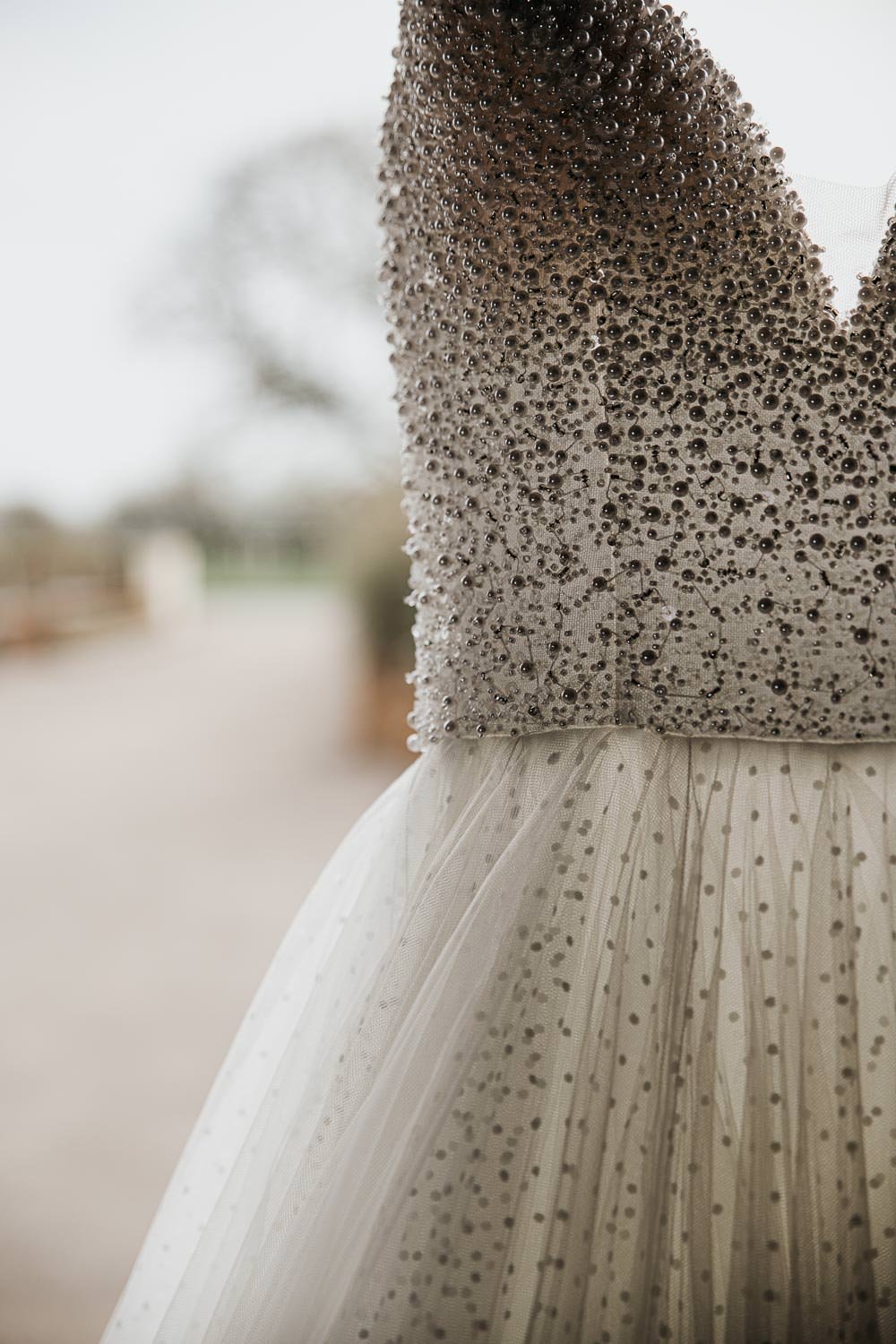 A line wedding dress with pearl details