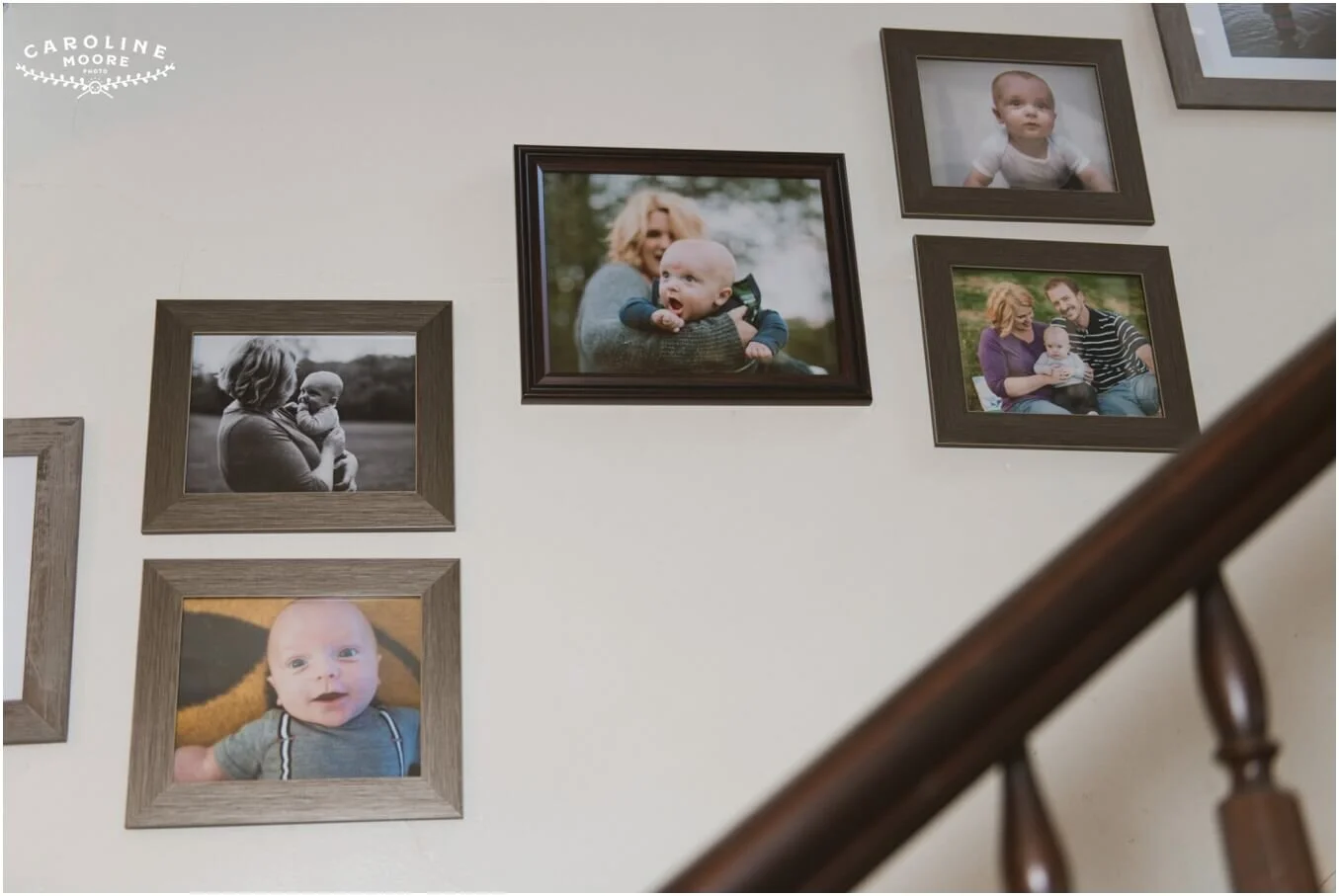 A wall covered in framed photos