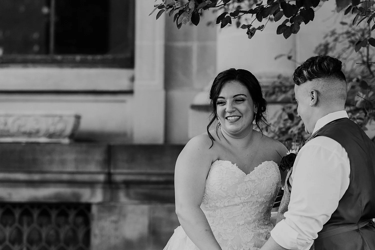 Couple portrait of bride and groom, mainly showing the bride's face