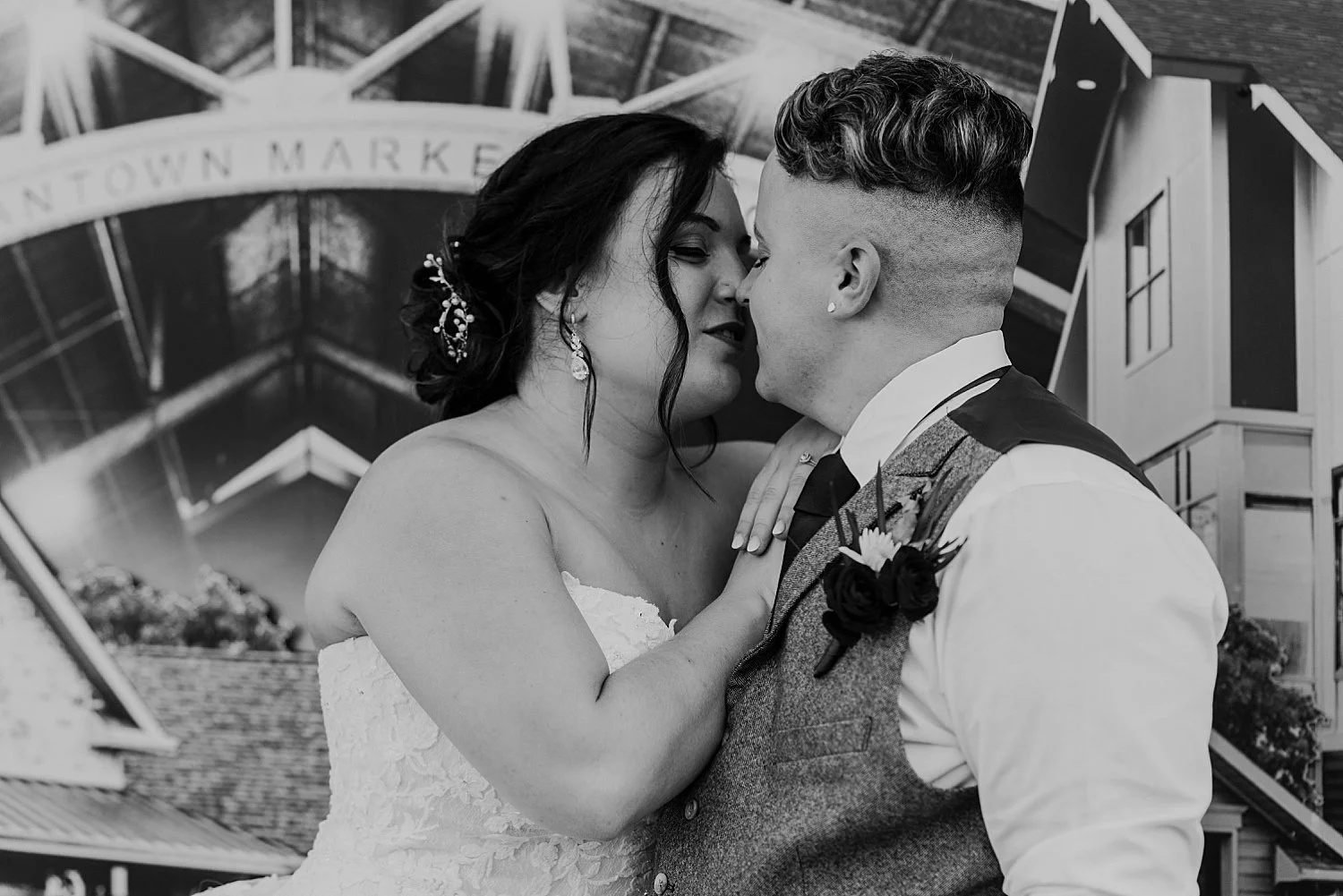 Close up, bride and groom are almost kissing, black and white photo