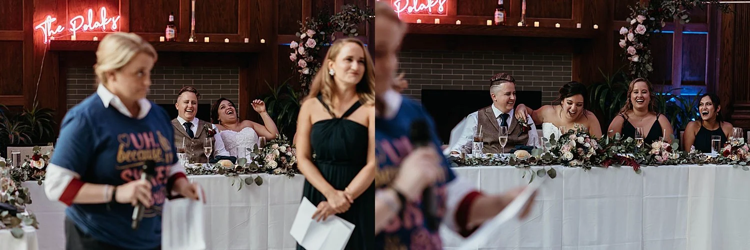 The bride is laughing uproariously at a speech given by the matrons of honor