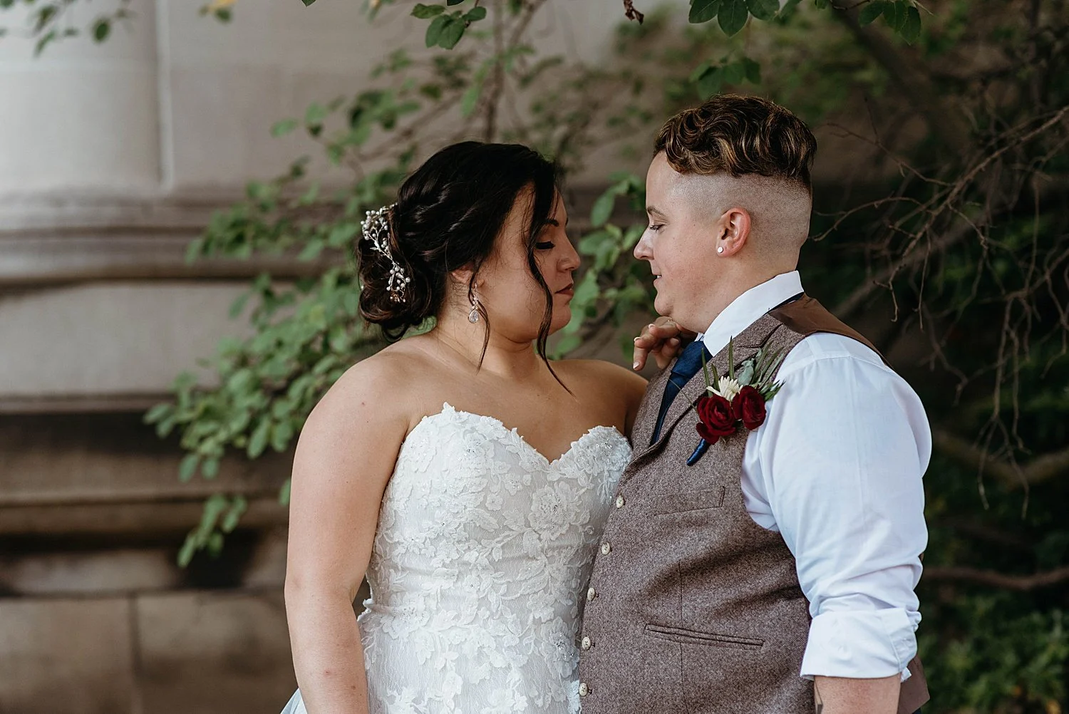 Bride and groom looking at each other