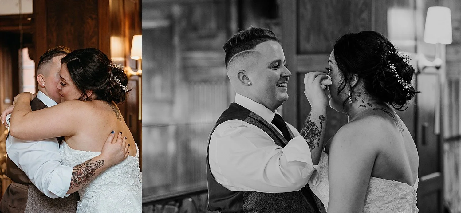 Groom is drying bride's tears with a tissue after their first look
