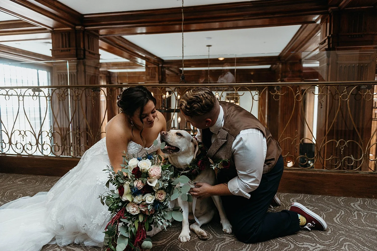 Trans couple pose with their dog before their west virginia wedding