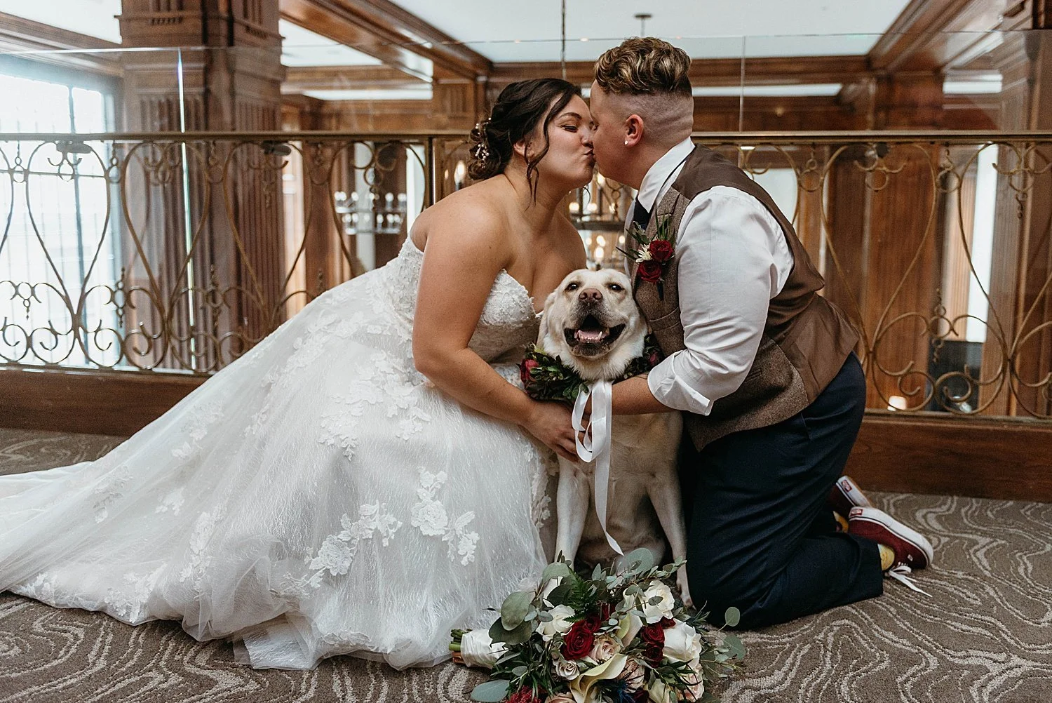 LGBT couple pose with their dog before their west virginia wedding