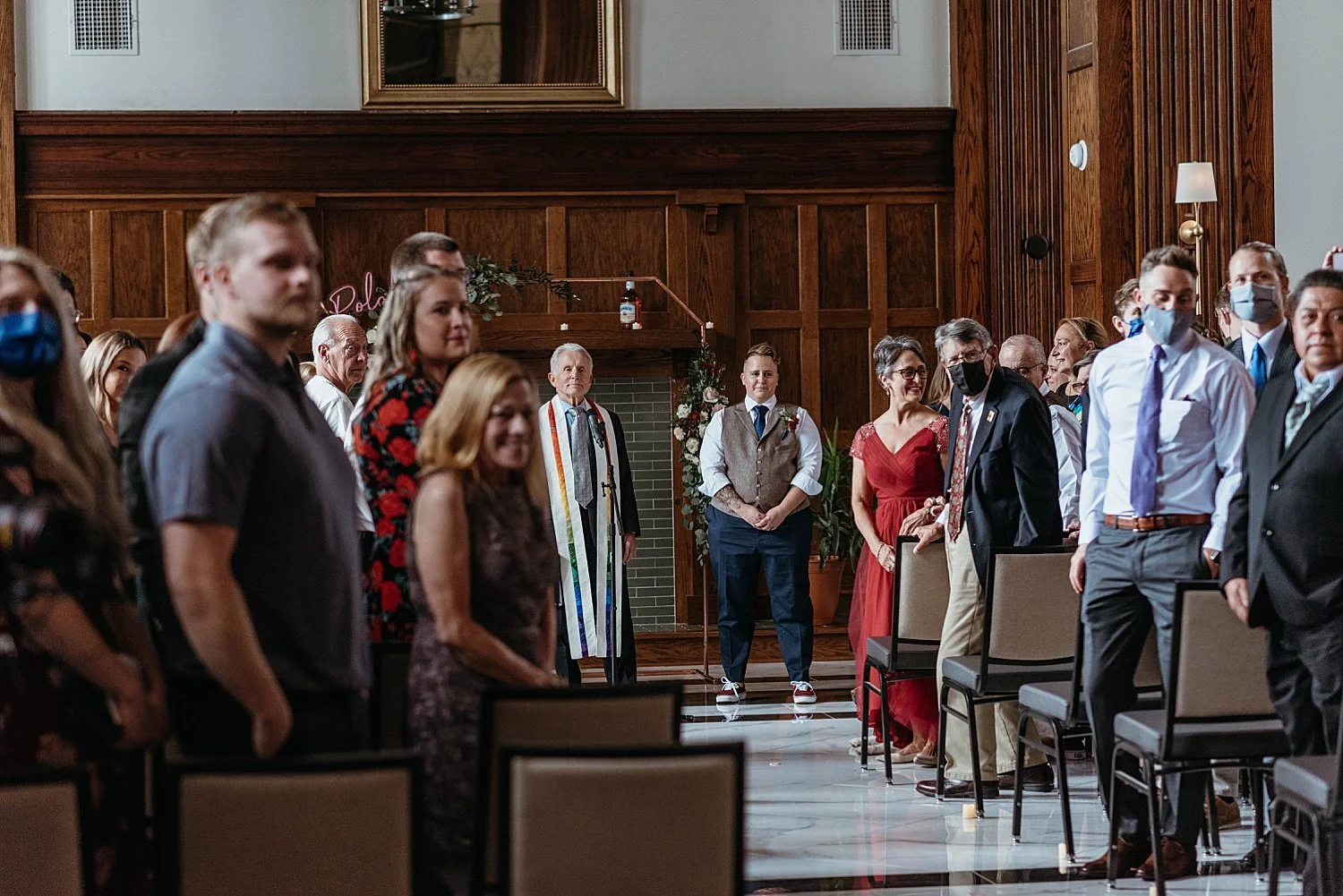 Groom watching his bride walk down the aisle at Hotel Morgan, he looks emotional.
