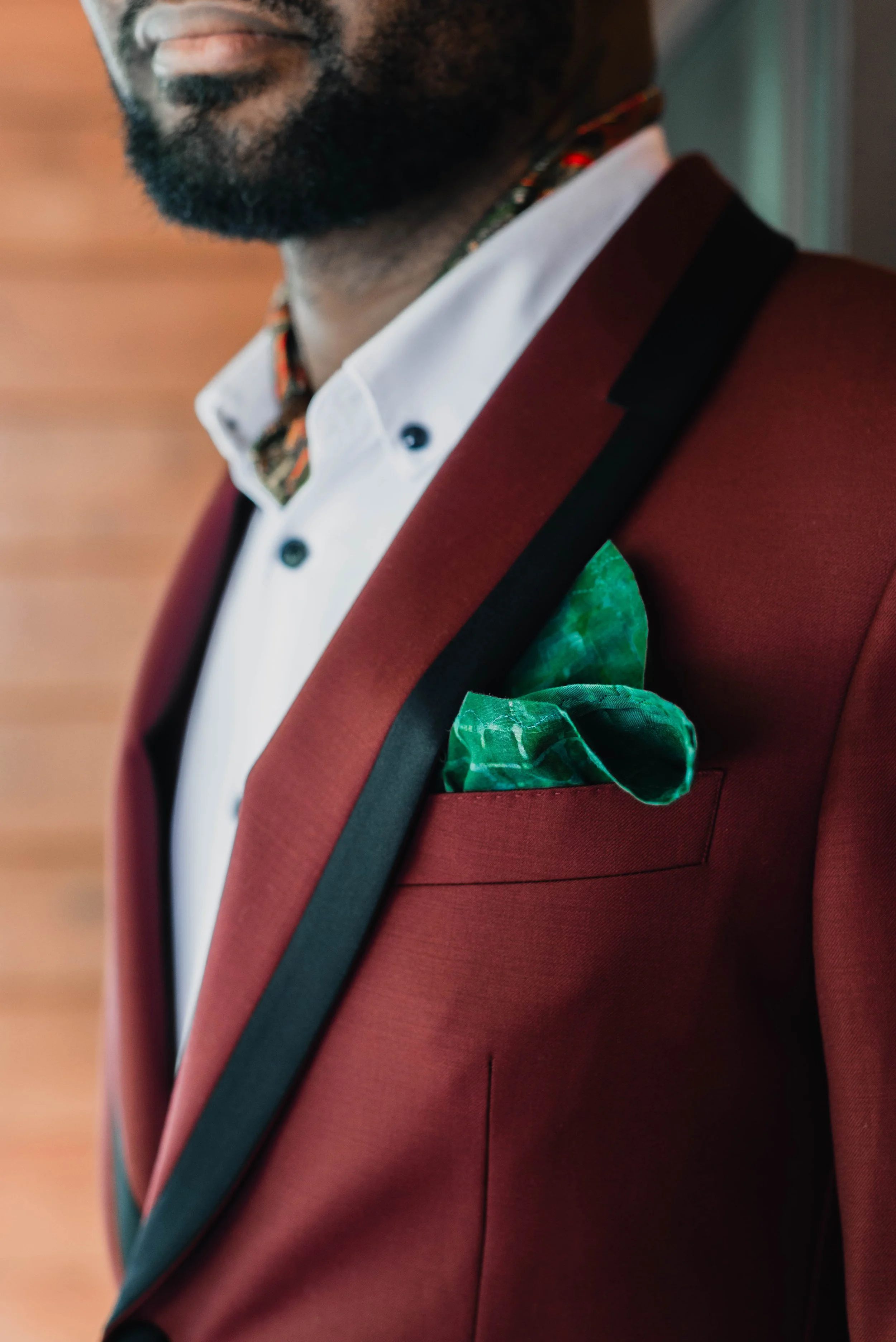 Detail shot of groom's pocket square, elopement at Racoon Creek State Park