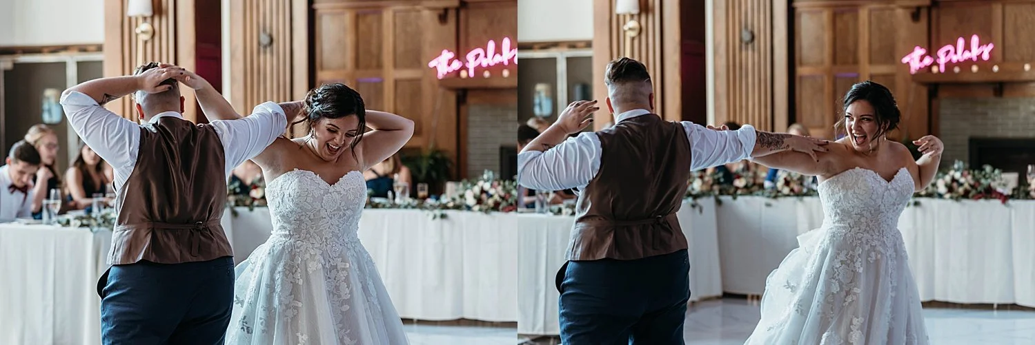 bride and groom dance and smile, they are holding hands and putting each other's arms behind their heads