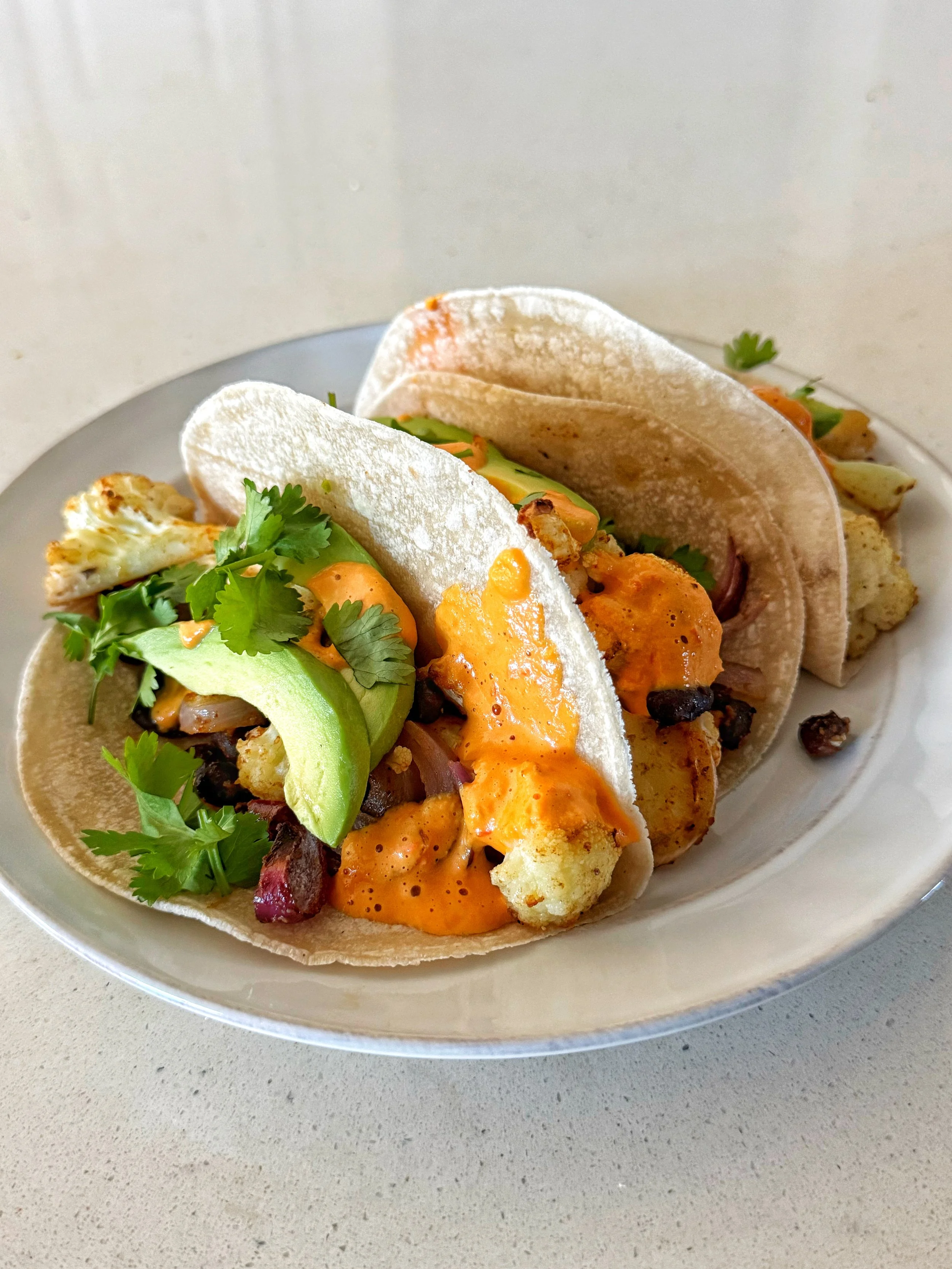 Black Bean And Cauliflower Tacos With A Roasted Red Pepper Sauce