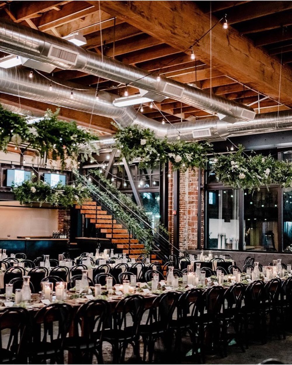 Floral magic from @mimosafloralco
&bull;
One of our biggest undertakings to date! The massive ceiling height &amp; precision of hanging these rows in a perfect line were the two challenges. I love designing pretty bouquets, but large scale installati