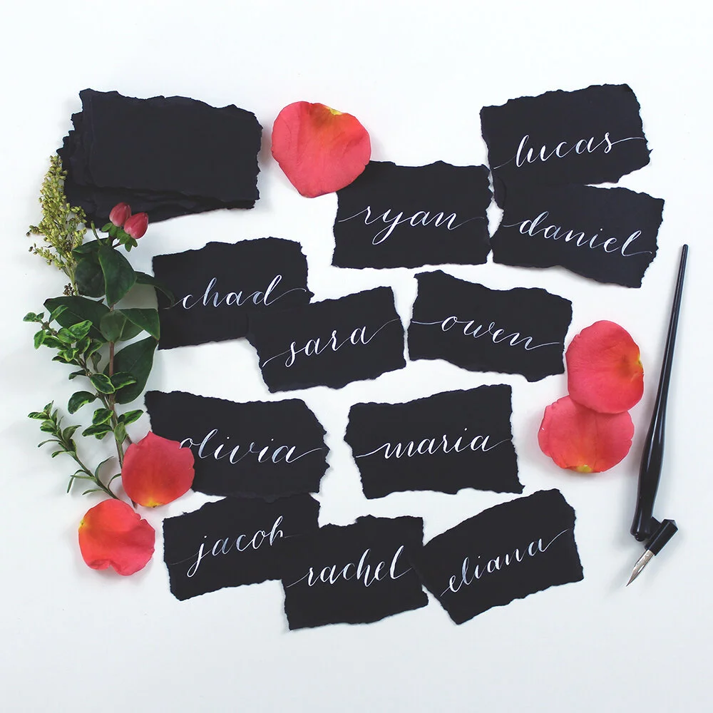 Calligraphy_white_ink_black_paper.jpg