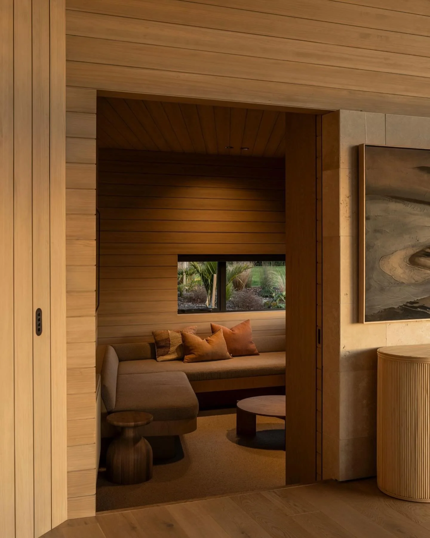 Sunken movie room with a timber pocket sliding door 🍿