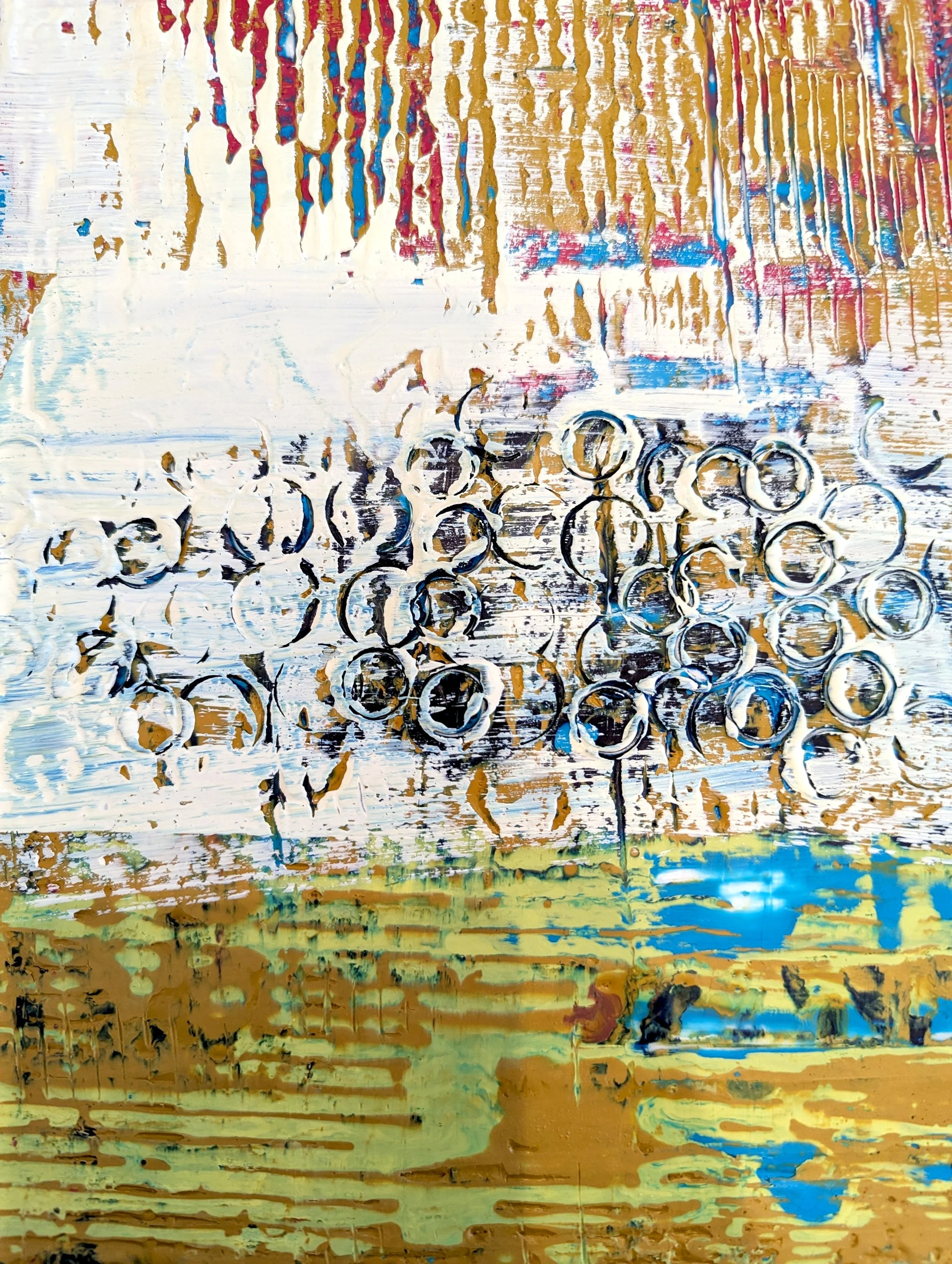 Abstract painting featuring black circles, orange, white, blue, and green colors with textured brushstrokes.