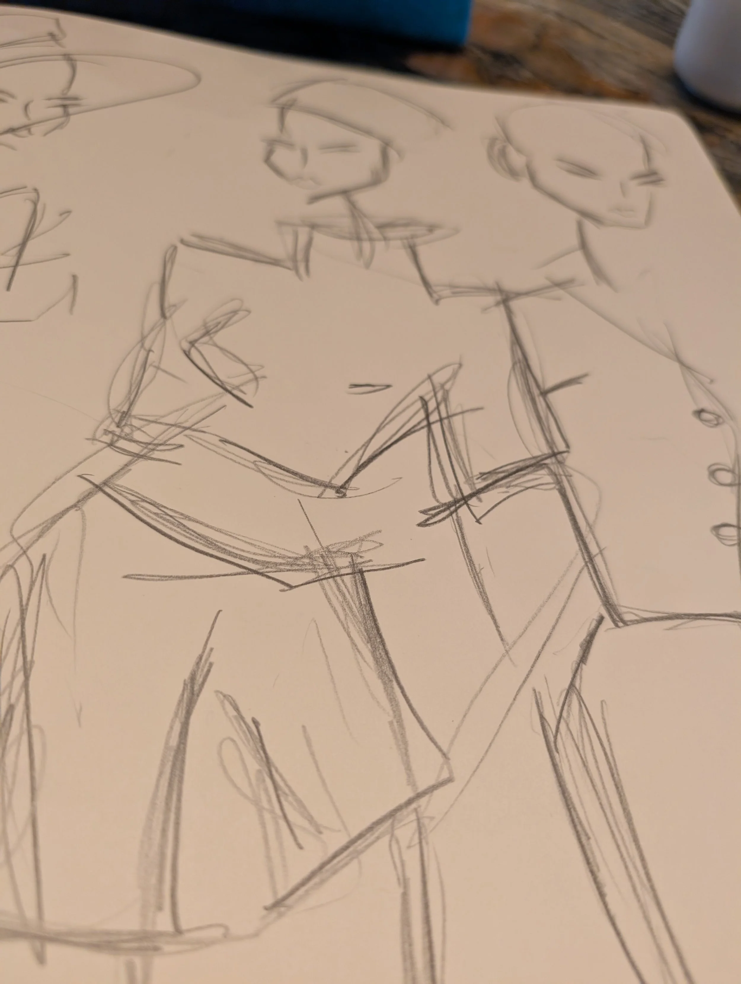 Sketch of a woman in a confident pose on a piece of paper.