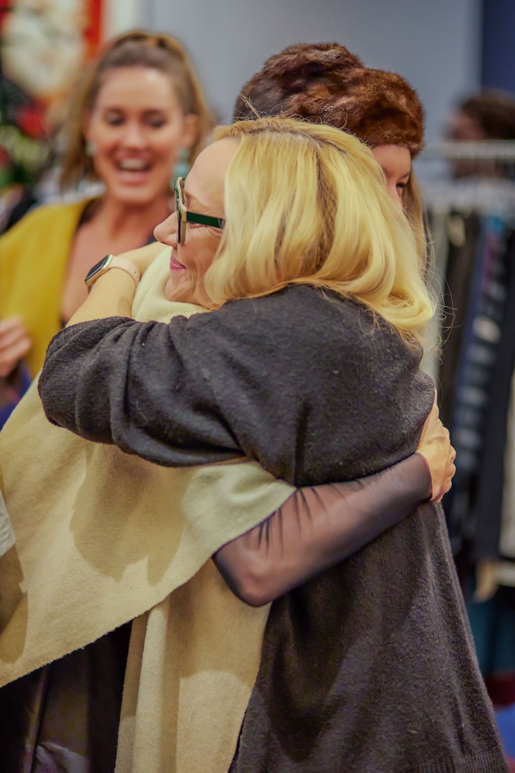 Attendees hug at Roboro's Green for Good Benefit in Beverly Hills