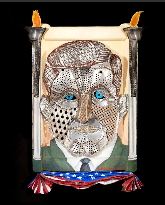 John F. Kennedy (J.F.K.), 1999. Oil on wired tin, acrylic on wood with found objects, 24 × 15½ × 6 in.  Hallie Ford Museum of Art, Maribeth Collins Art Acquisition Fund 2011.021.003