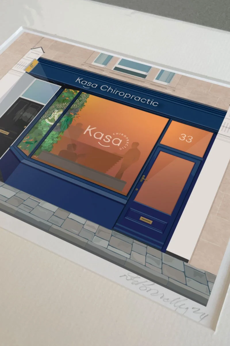 An image showing a print of my illustration of the shop front of Kasa Chiropractic. Drawn as a Precious Places project