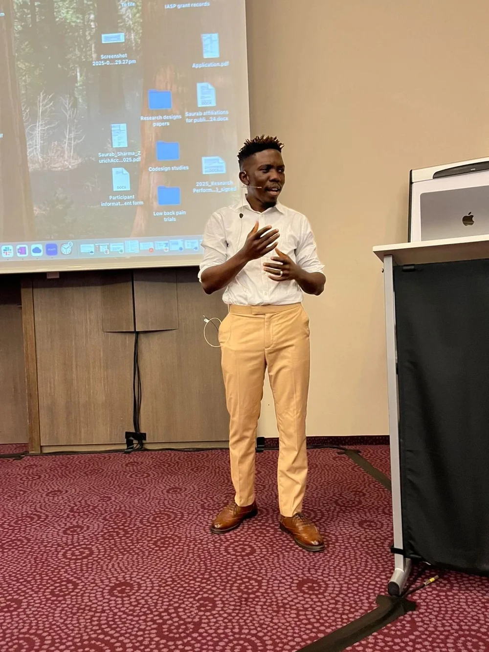 Mufudzi presenting in Switzerland IBNPRF.jpeg