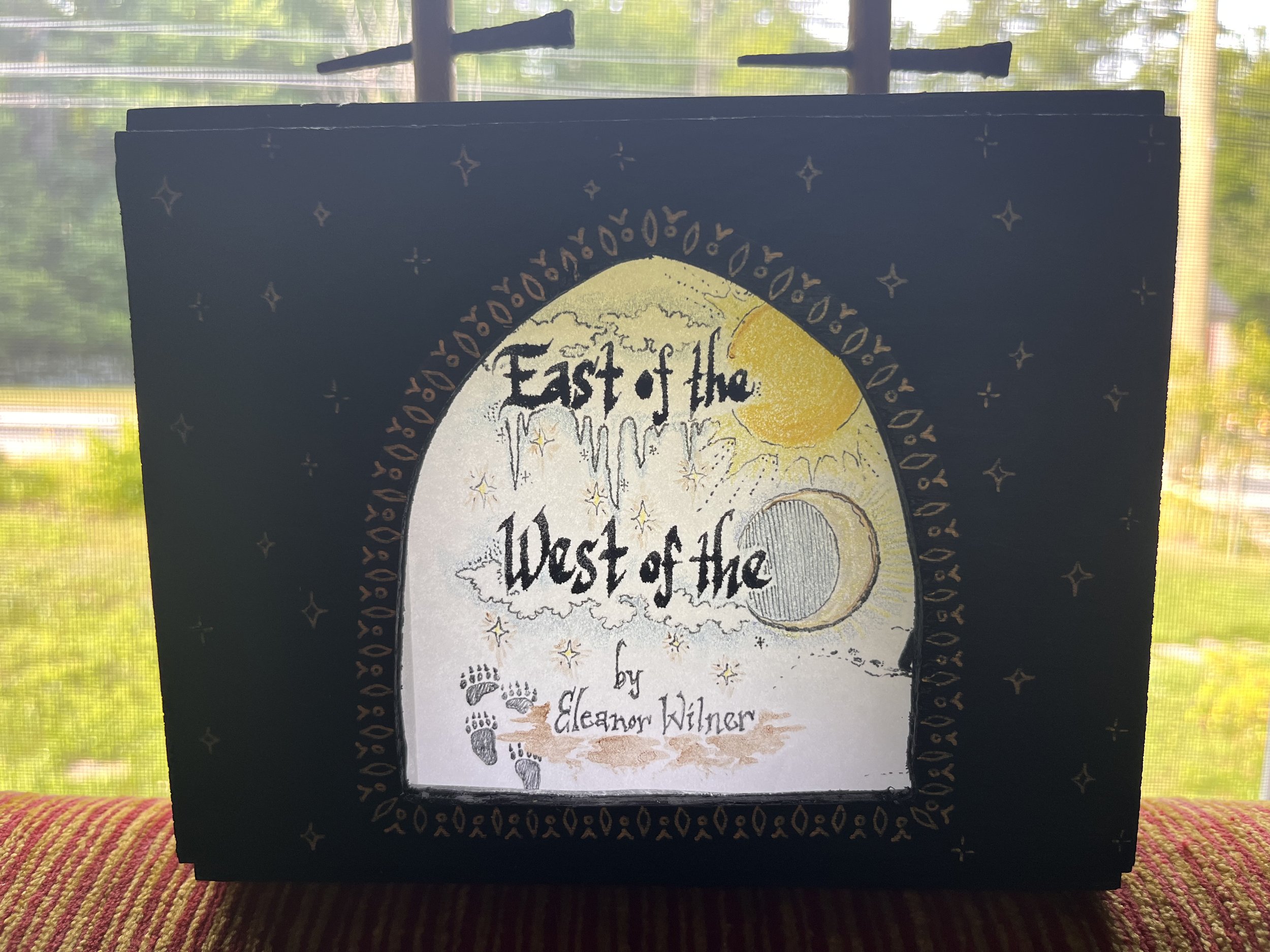 Kay Kinderman, East of the Sun, West of the Moon, handmade wooden box, paper scroll, ink, colored pencil and watercolor, 2025