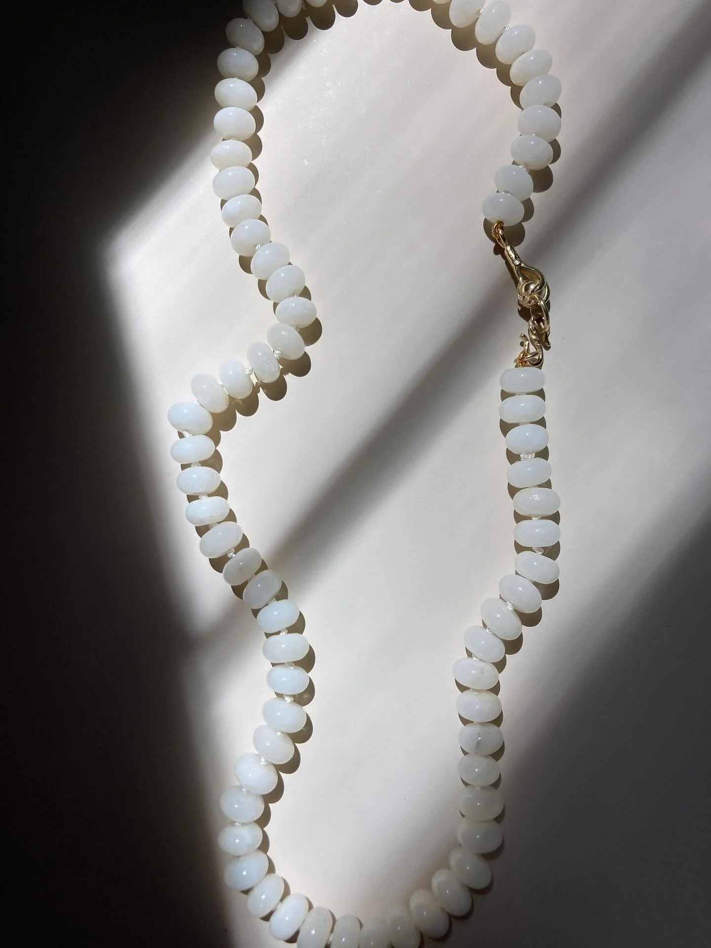 Summer is calling, and she wants you draped in goddess energy.

This strand of luminous white jade beads with a golden clasp isn&rsquo;t just jewelry&mdash;it&rsquo;s a vibe. White jade radiates serenity and strength, while the glow of gold whispers 