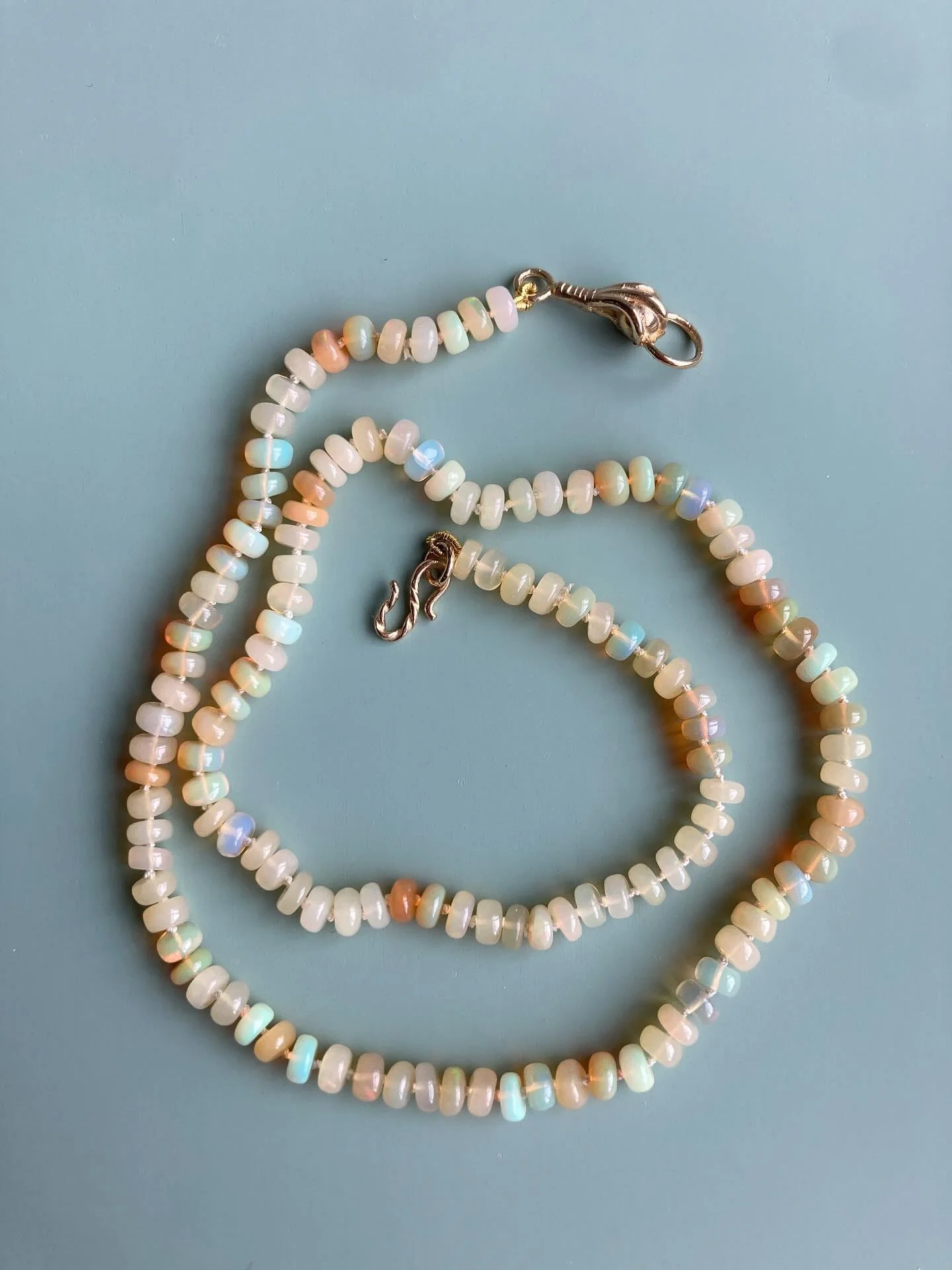 &ldquo;Imagine unlocking a century-old cabinet and finding this waiting within.&rdquo;

✨ The Curator&rsquo;s Opal ✨
A strand of soft alchemy, where light and mist entwine. Each opal bead holds a secret shimmer &mdash; hues of dawn and rainlight caug